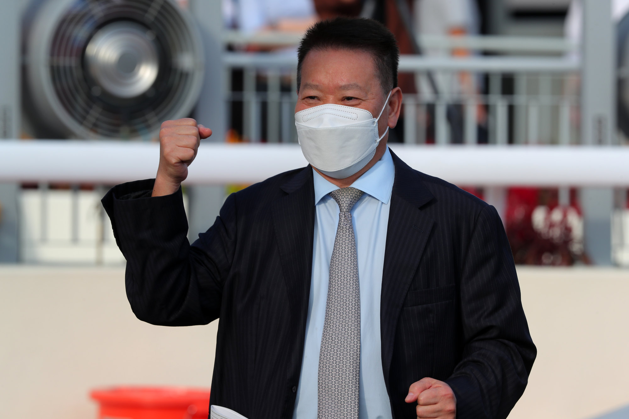 Trainer Manfred Man celebrates Lucky Sweynesse’s victory in the Jockey Club Sprint.