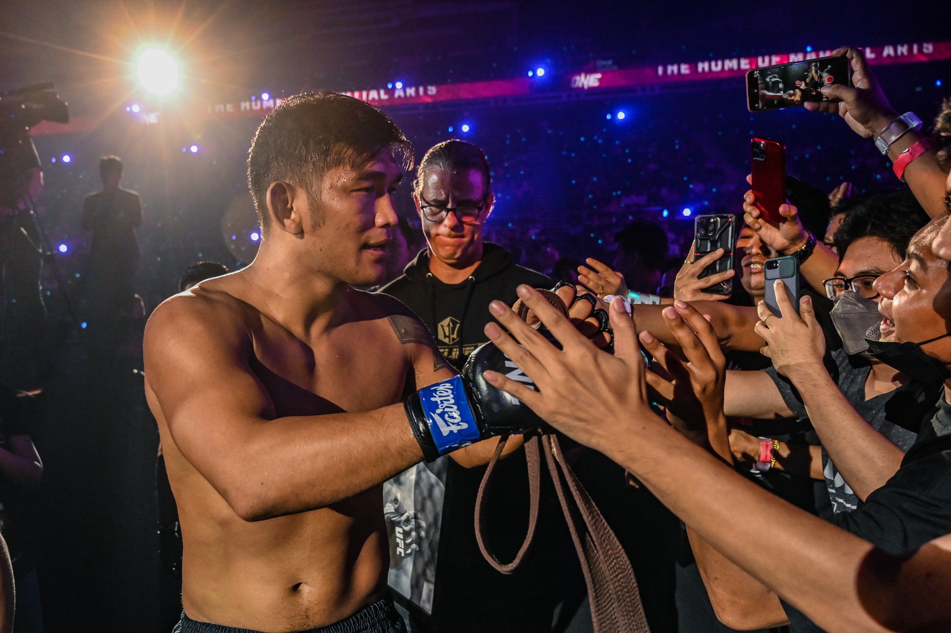 Aung La N Sang celebrates with the fans at ONE 163. Photos: ONE Championship