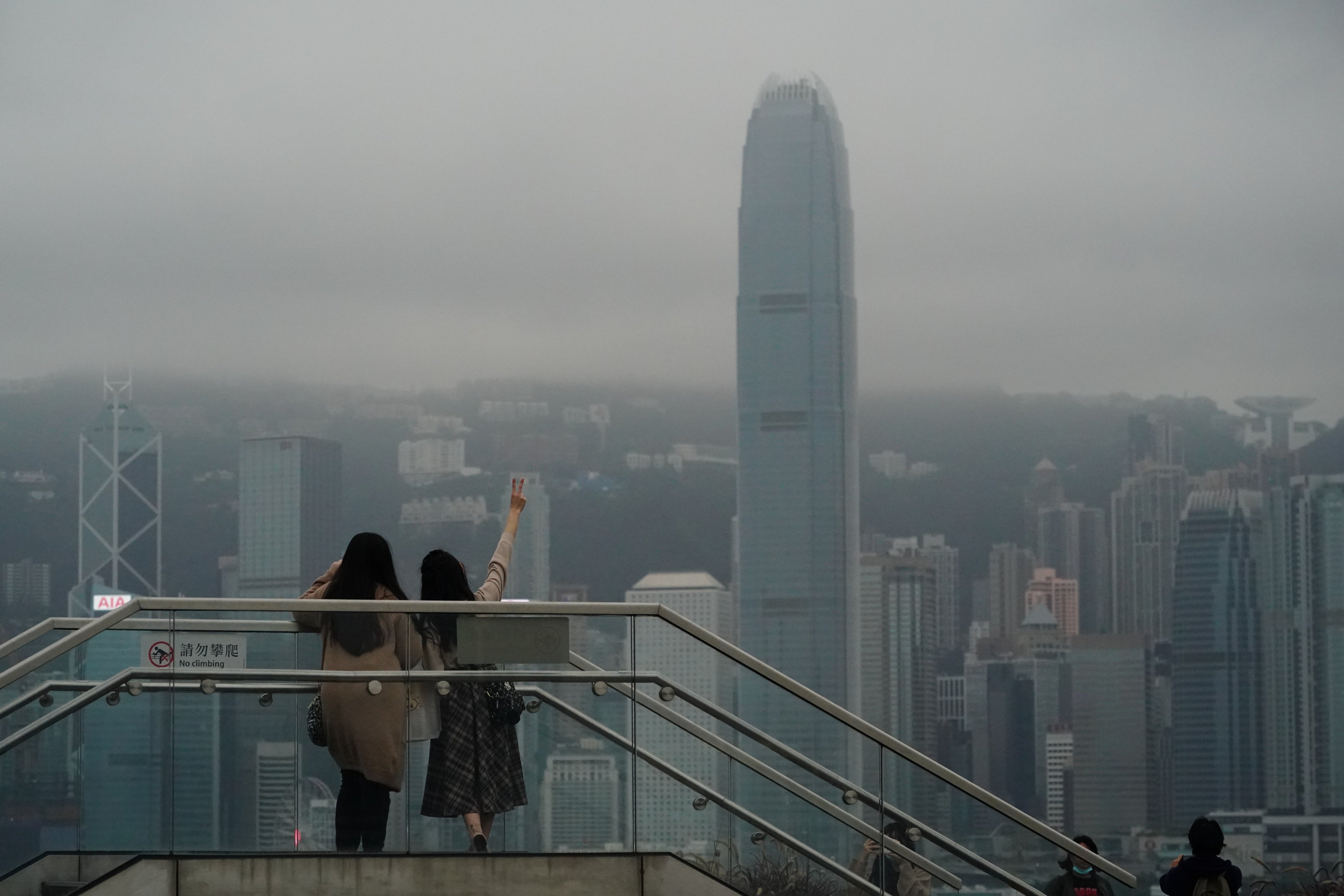 Visitors enjoy the view along the rooftop walkway of Hong Kong’s West Kowloon Station on January 22. Safeguarding the rights of same-sex couples could serve the city well as it seeks to out-compete its regional rivals. Photo: Felix Wong