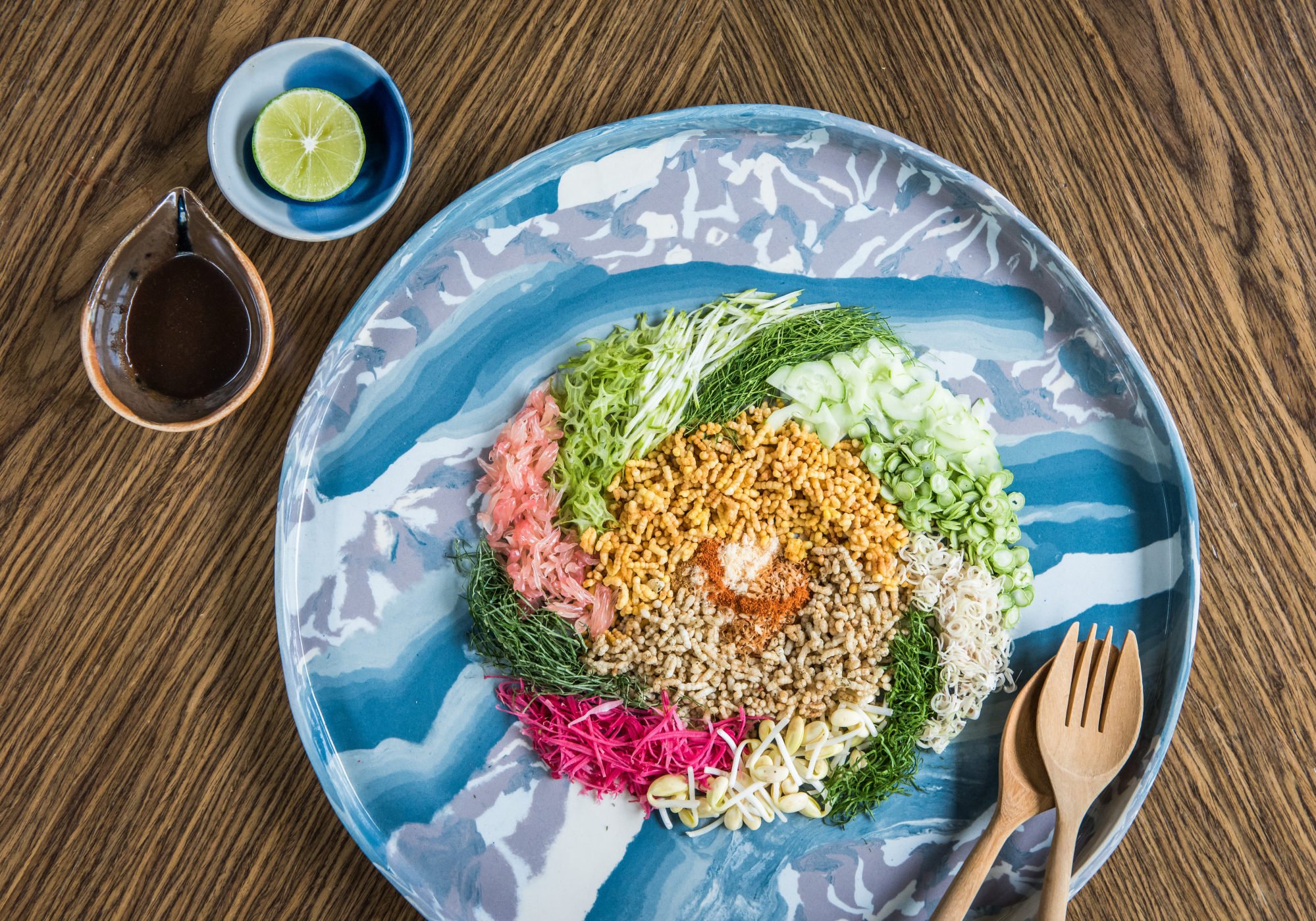 A Thai salad made with herbs, turmeric rice, morinda rice and a fish innards dressing at Sorn. Photo: Sorn