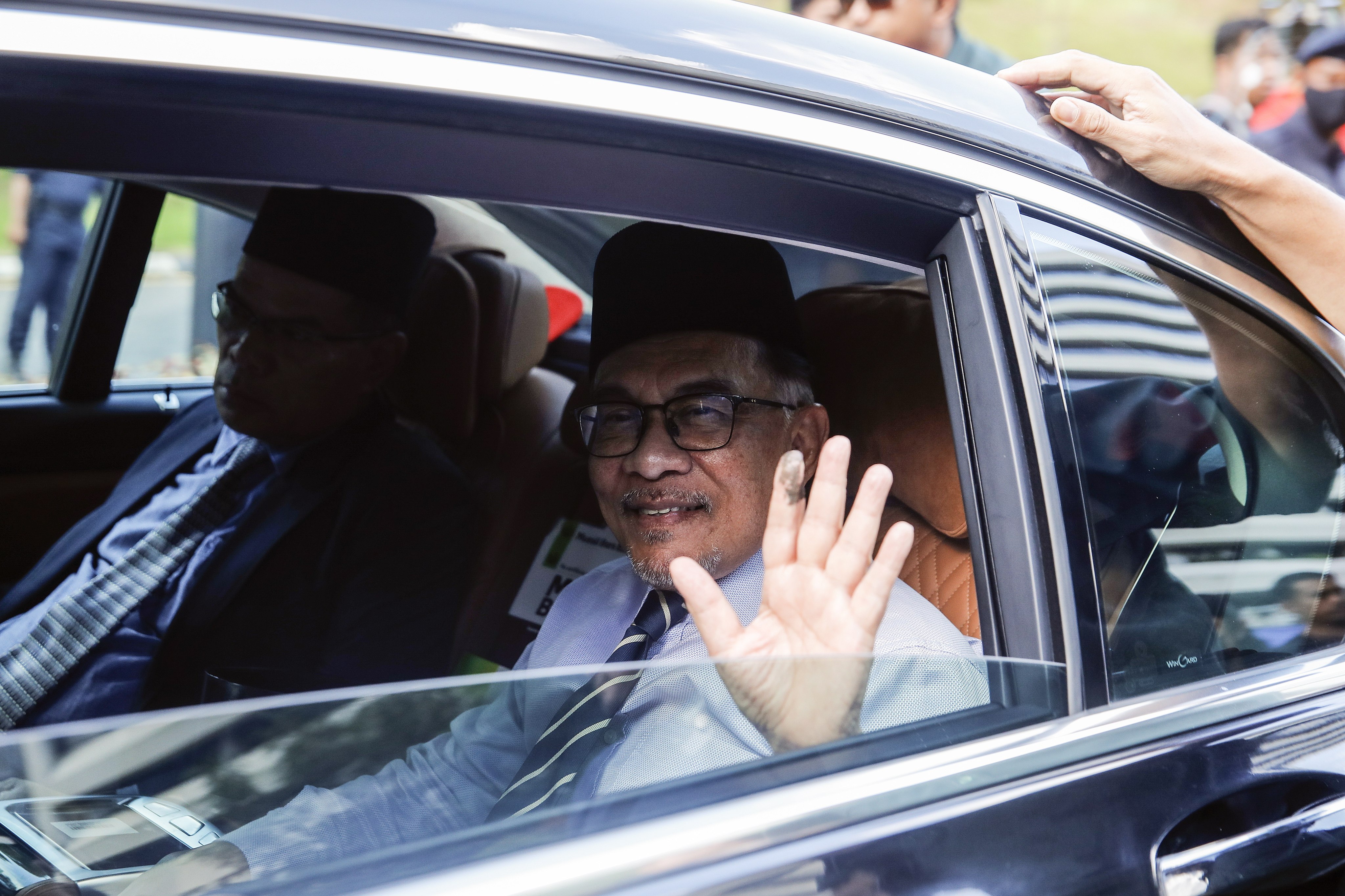 Anwar Ibrahim arrives at the national palace to meet the king on Tuesday. Photo: EPA-EFE