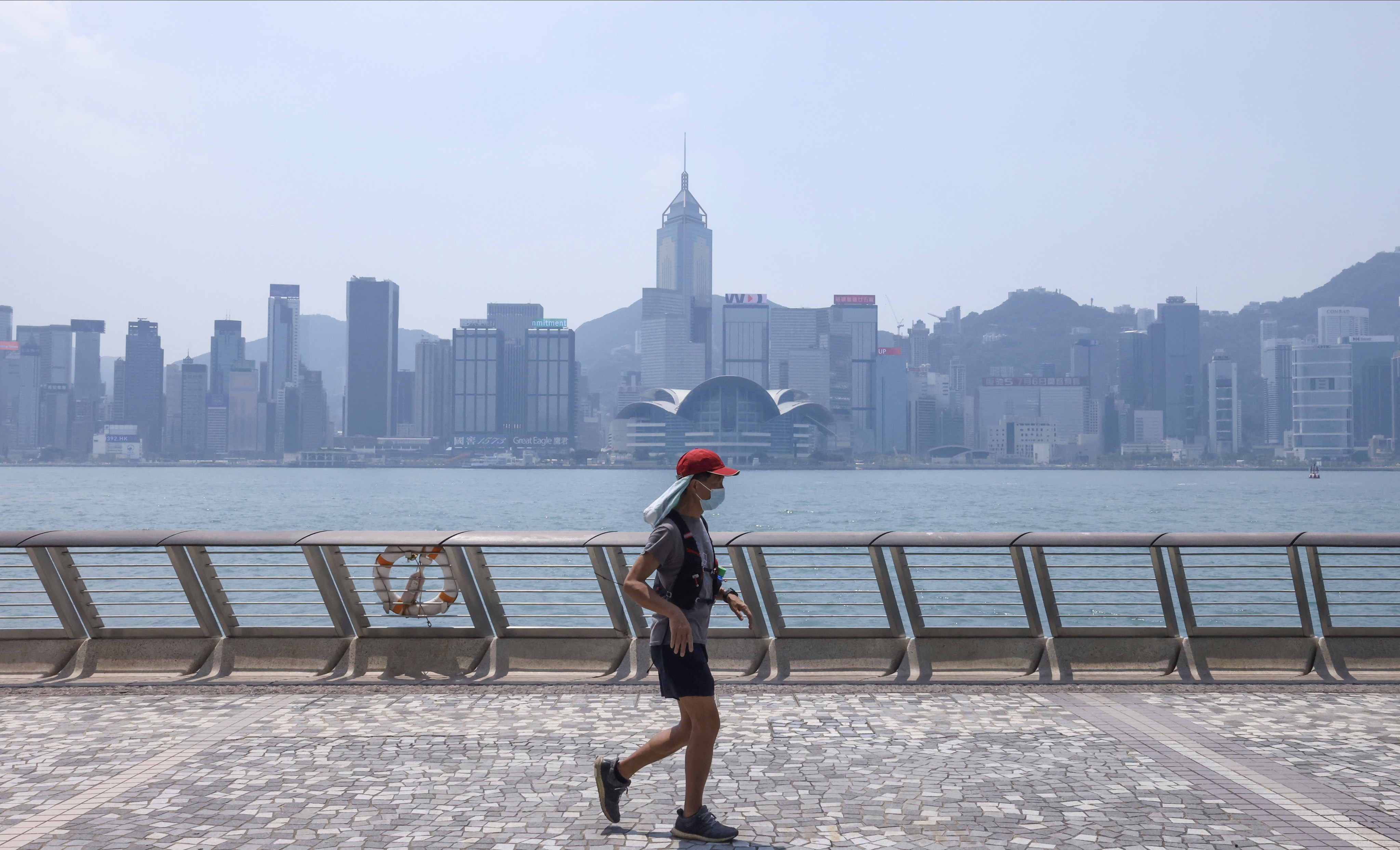 A jogger in Hong Kong during a hot weather warning on September 12. Photo: Jonathan Wong