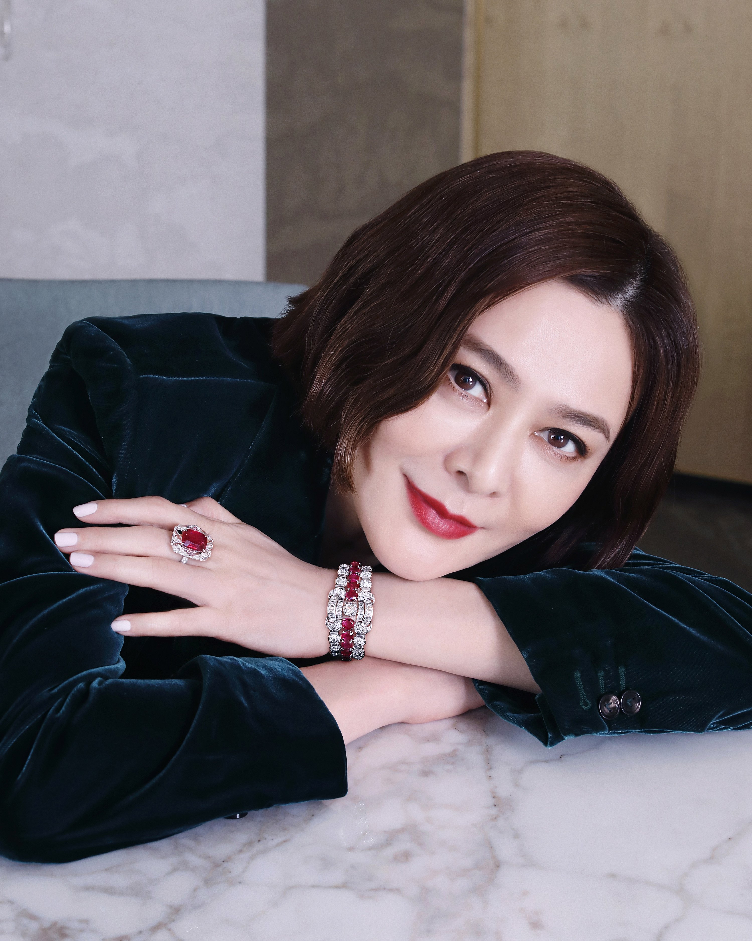 Rosamund Kwan wears a ruby and diamond ring estimated to sell for US$2.8 million-4.5 million at a Christie’s auction. Photo: Christie’s Images
