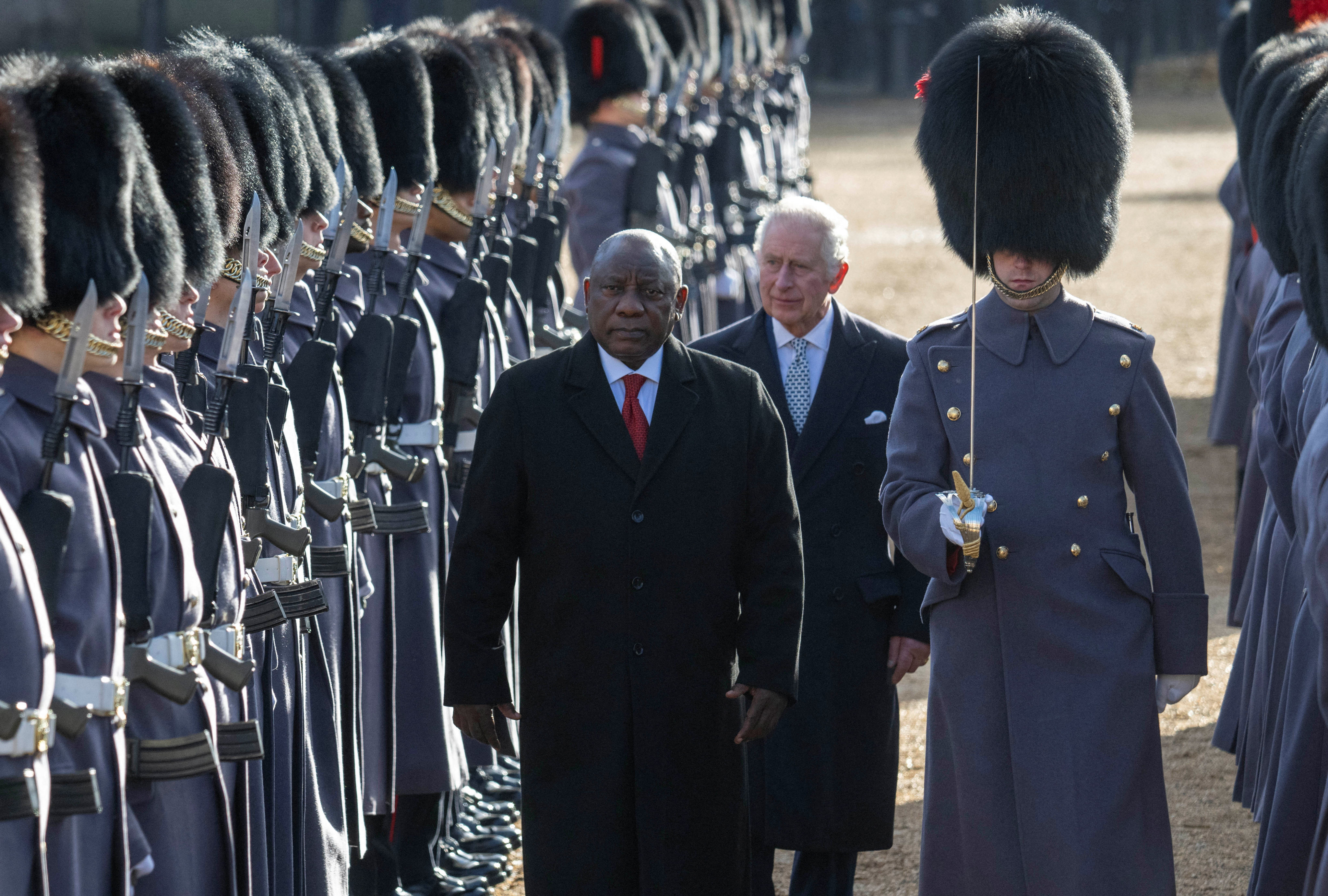 Britain’s King Charles walks with the President of South Africa Cyril Ramaphosa at a Ceremonial Welcome in London on Tuesday. Photo: Reuters
