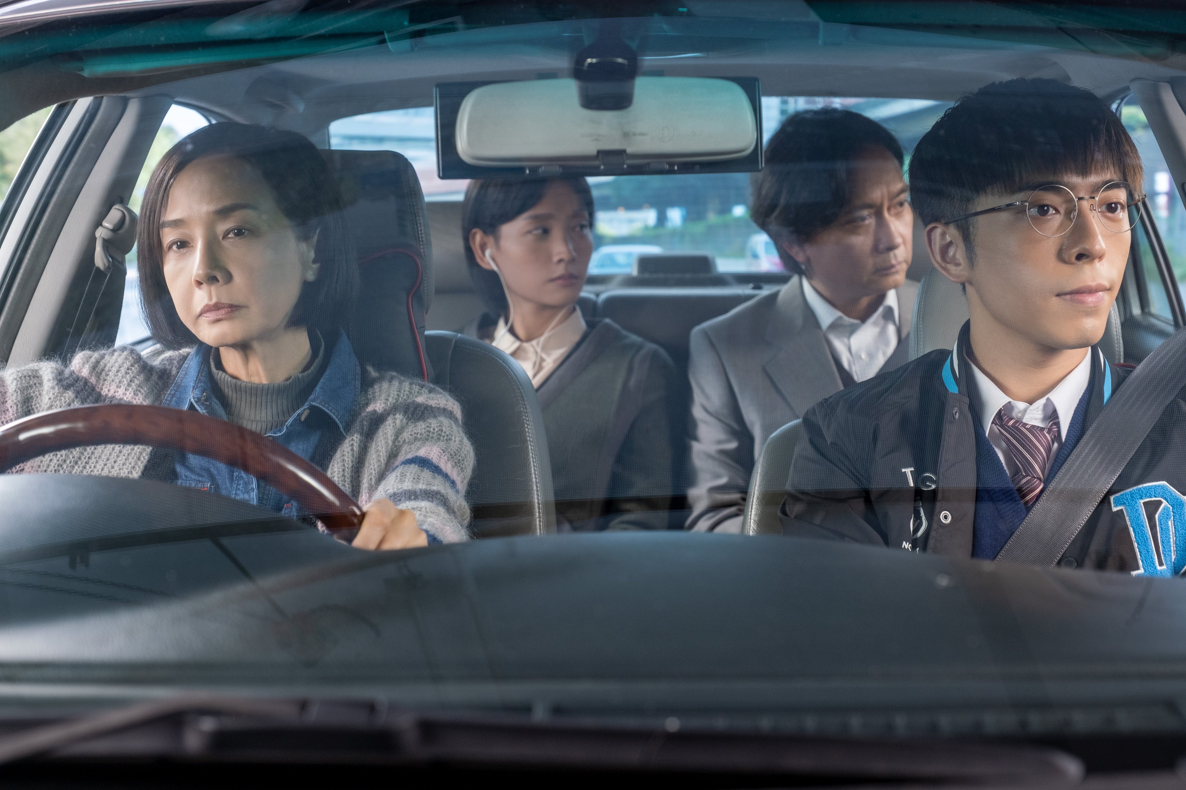 (From left) Teresa Mo, Hedwig Tam, Tse Kwan-ho and Edan Lui in a still from Hong Kong Family.
