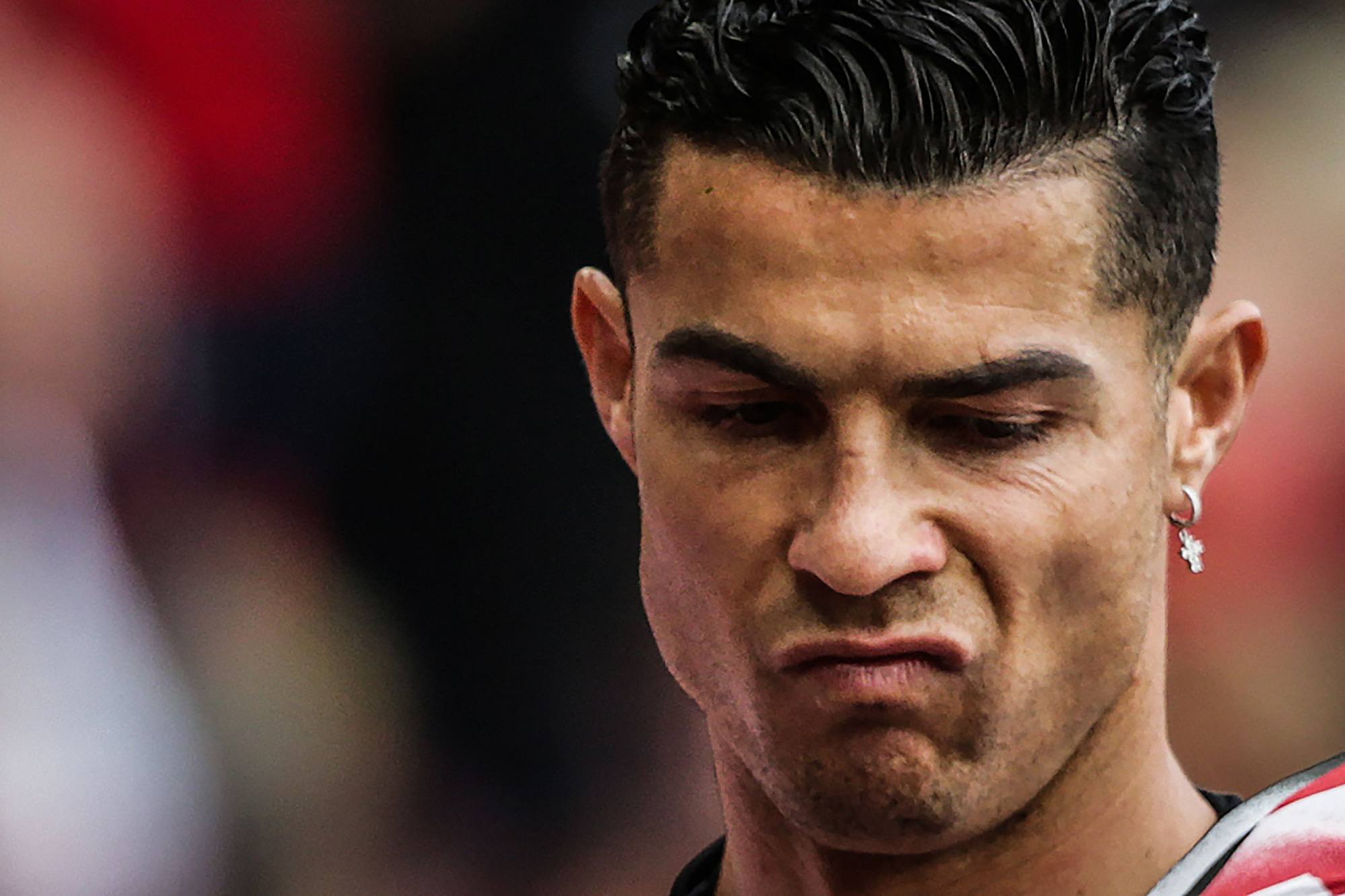 Ronaldo reacts during the warm up before the English Premier League football match against Newcastle at Old Trafford. Photo: AFP