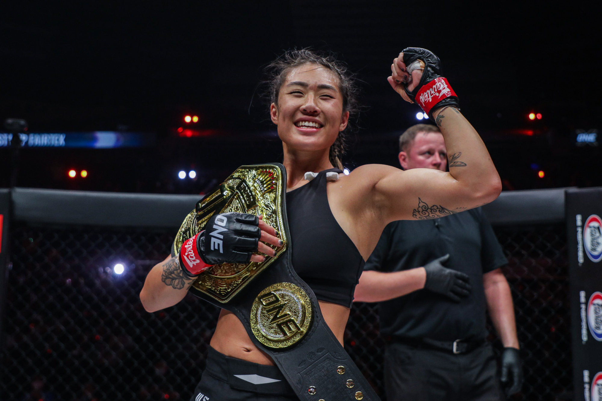 Angela Lee celebrates after submitting Stamp Fairtex at ONE X.