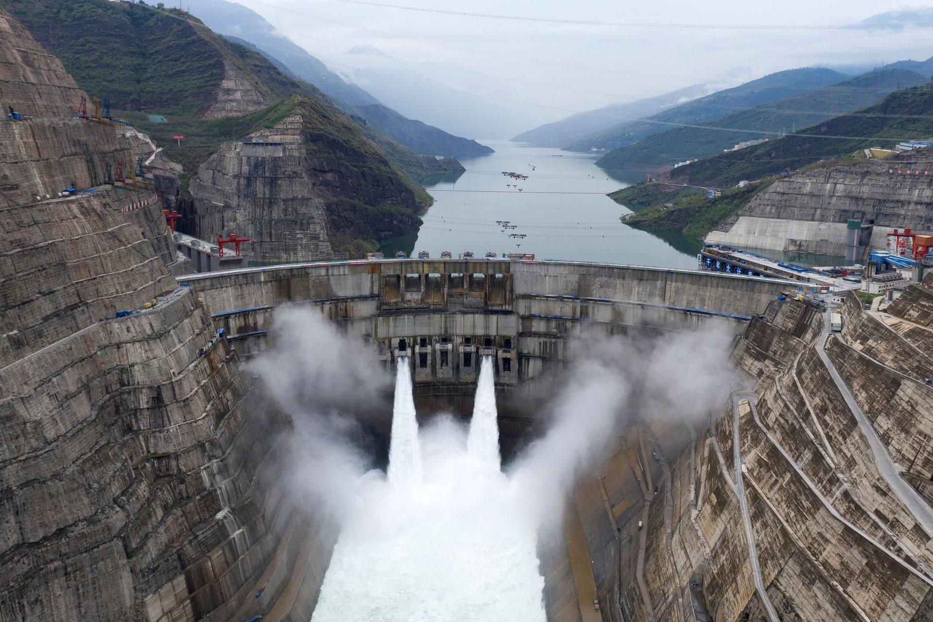 The Baihetan hydropower plant is seen in operation on the border between Qiaojia county of Yunnan province and Ningnan county of Sichuan province in China on June 28, 2021. Photo: Reuters