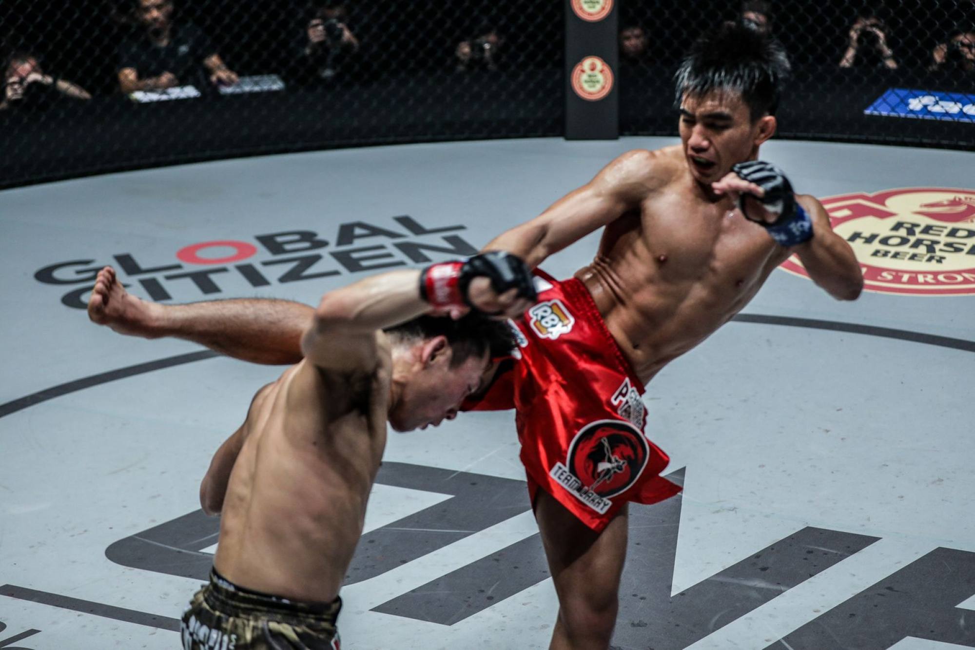 Joshua Pacio knocks out Yosuke Saruta with a knee.