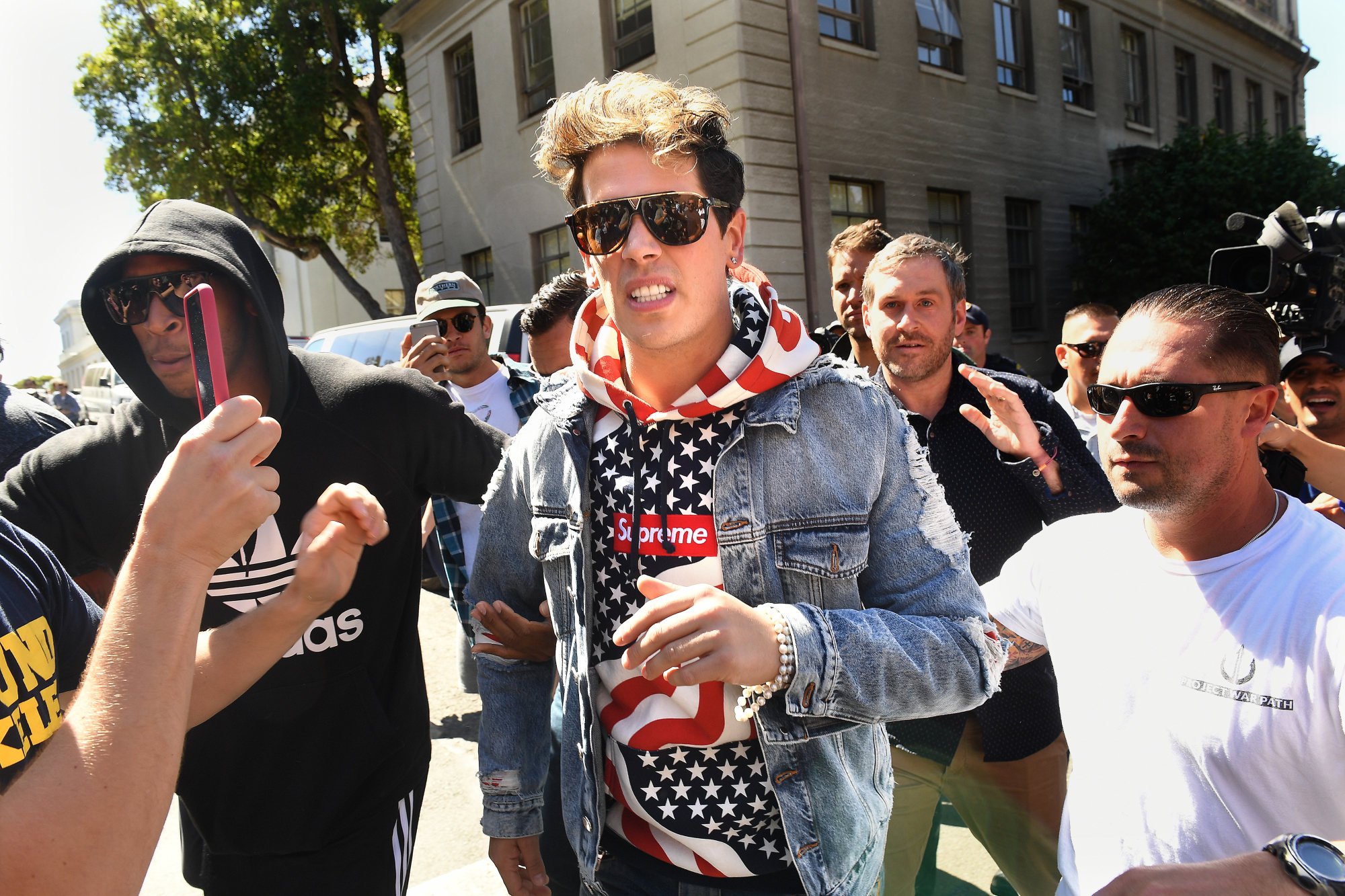 Milo Yiannopoulos prompted violent protests when he attempted to give a talk at the University of Berkeley in California, but Donald Trump defended him. Photo: LA Times via Getty Images