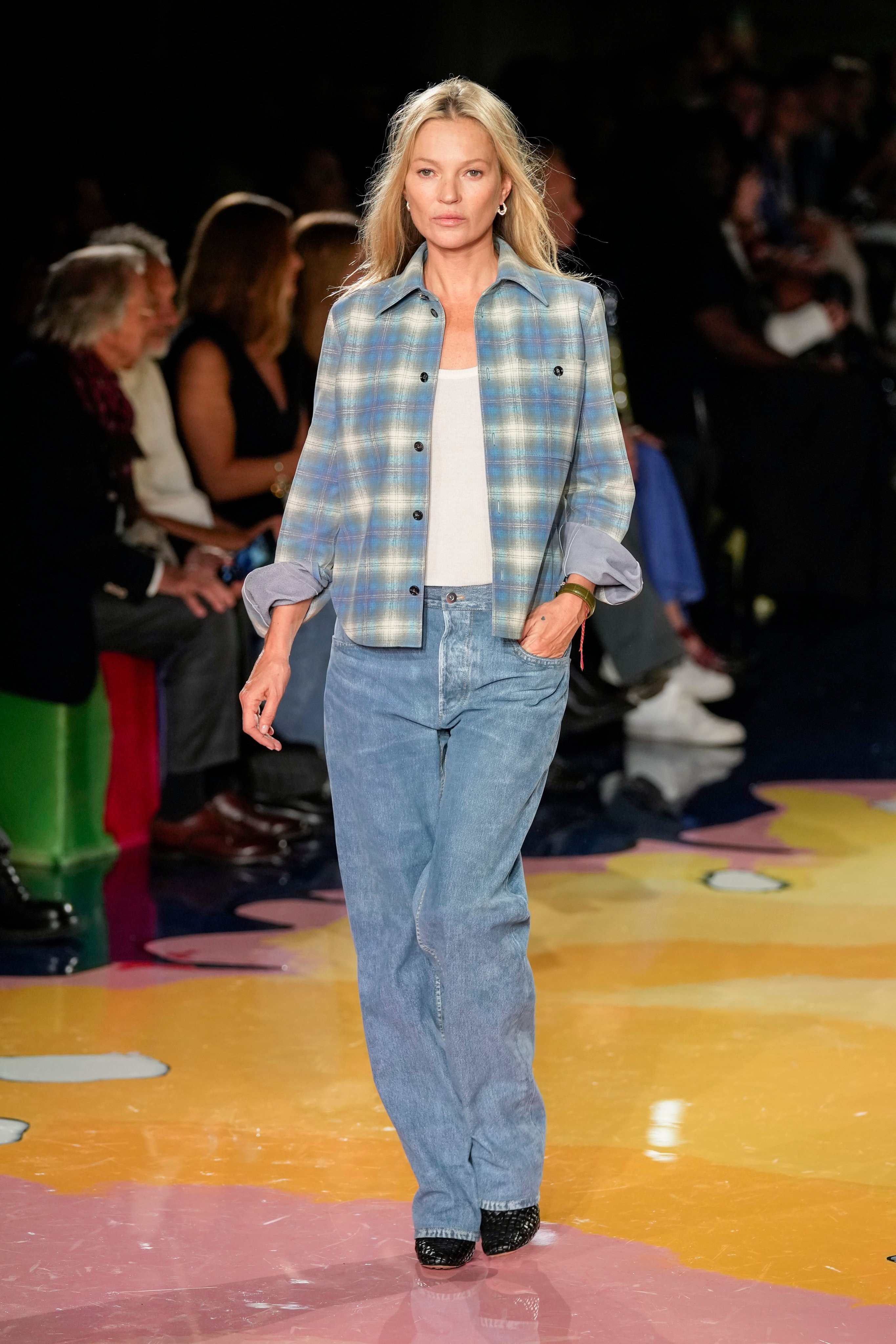 Kate Moss models a look from the Bottega Veneta women’s spring-summer 2023 collection. Photo: AP/Antonio Calanni