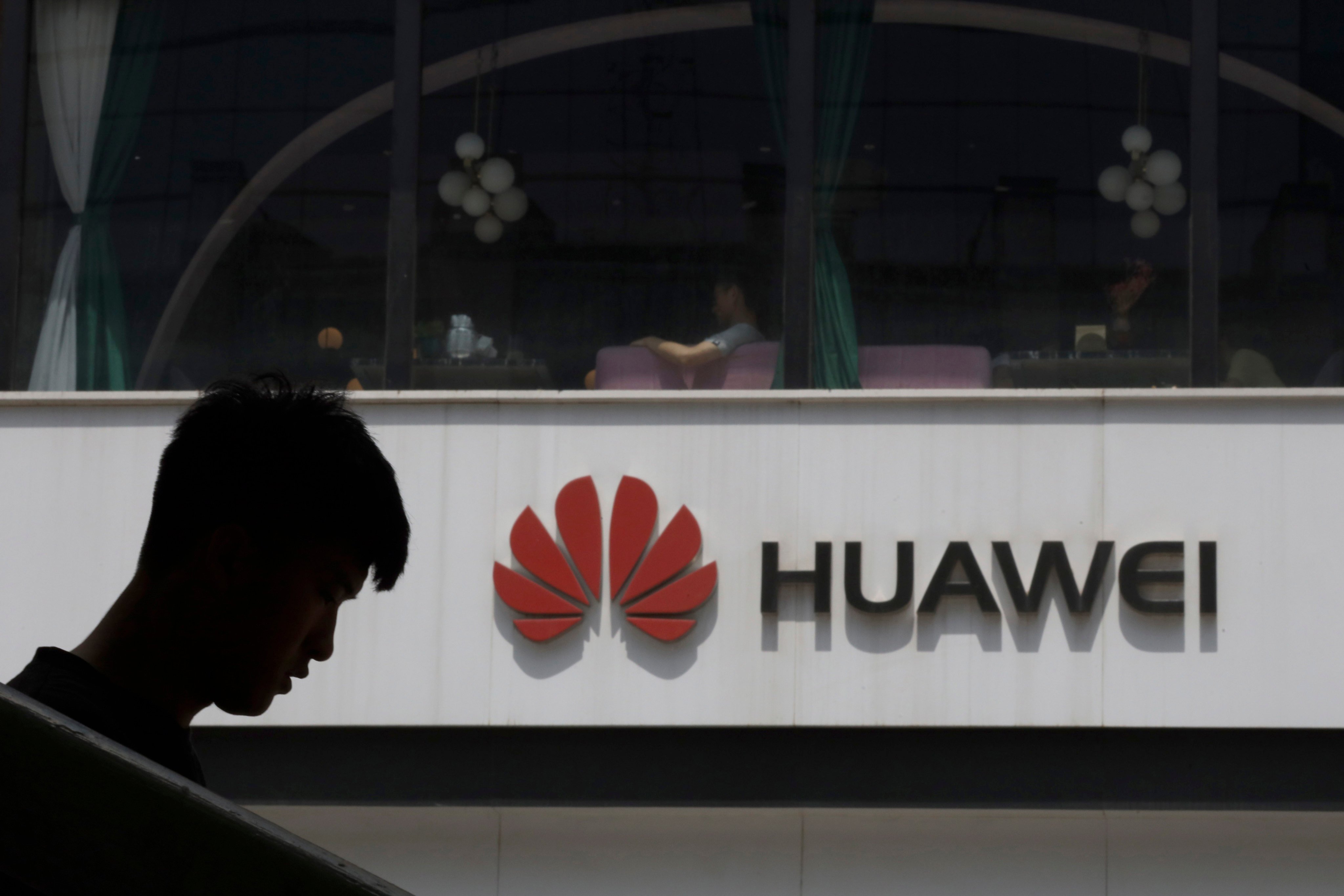 The Huawei logo is seen on a building in Beijing in May 2019. Photo: AP