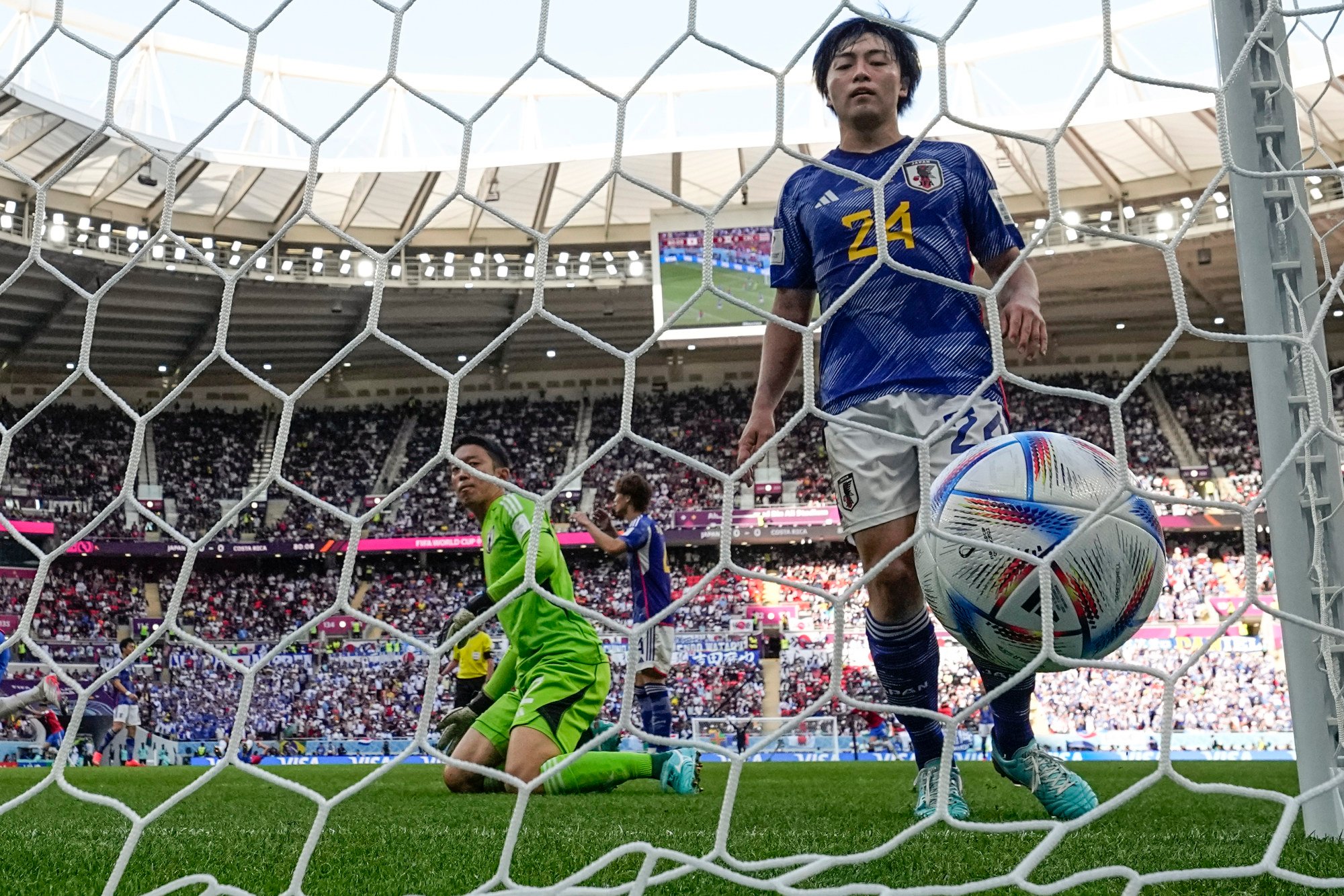 Japan’s goalkeeper Shuichi Gonda and Yuki Soma can only look as the ball nestles in the back of the net. Photo: AP