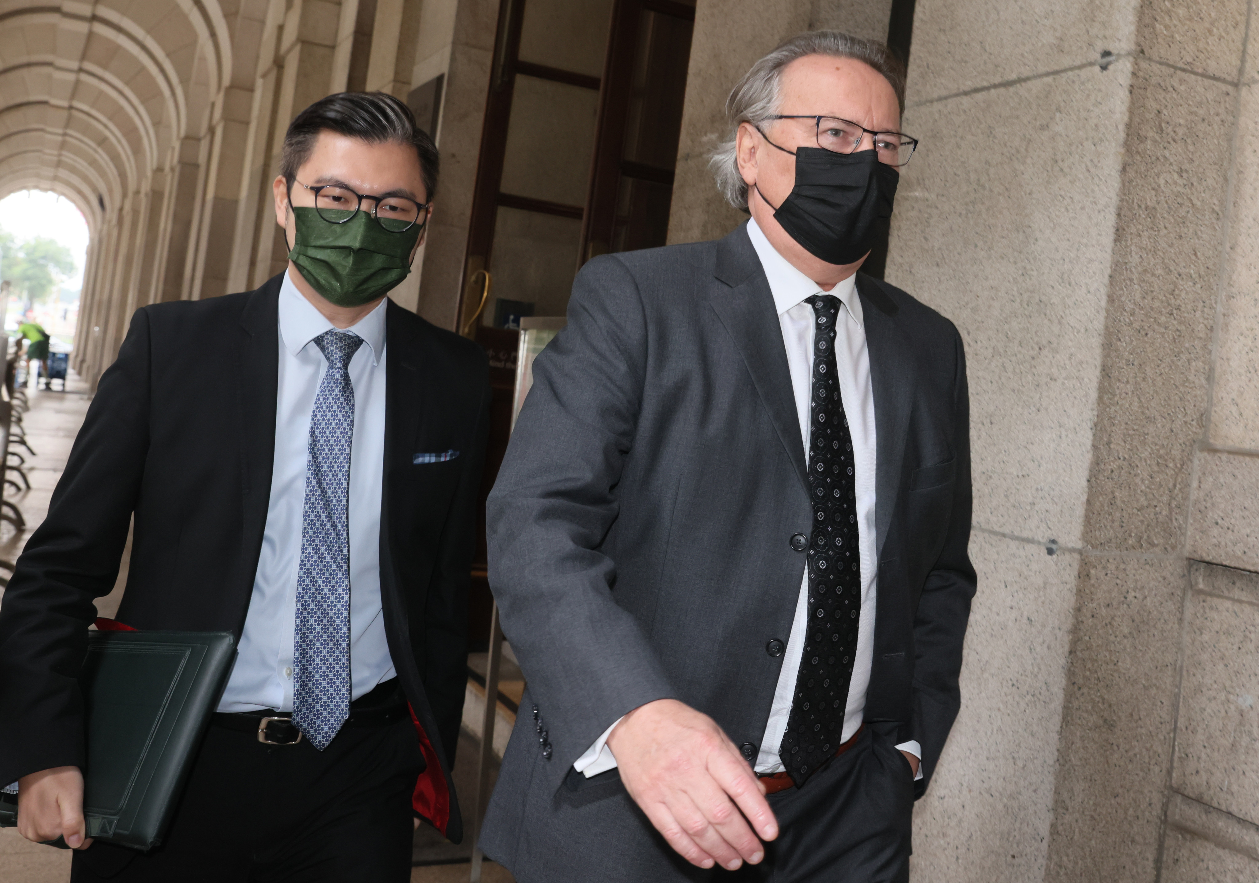 The Court of Final Appeal has dismissed the secretary for justice’s bid to overturn the permission granted to London-based Timothy Owen (seen in black mask) to join Jimmy Lai’s defence. Photo: Dickson Lee