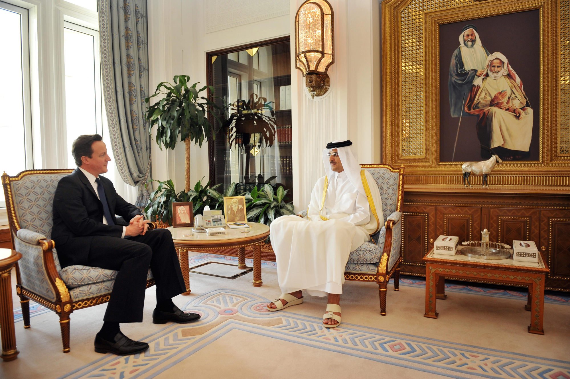 Former British Prime Minister David Cameron meets with the Crown Prince of Qatar Sheikh Tamim bin Hamad bin Khalifa Al-Thani, at the Royal Palace in Doha, Qatar. Photo: Getty Images