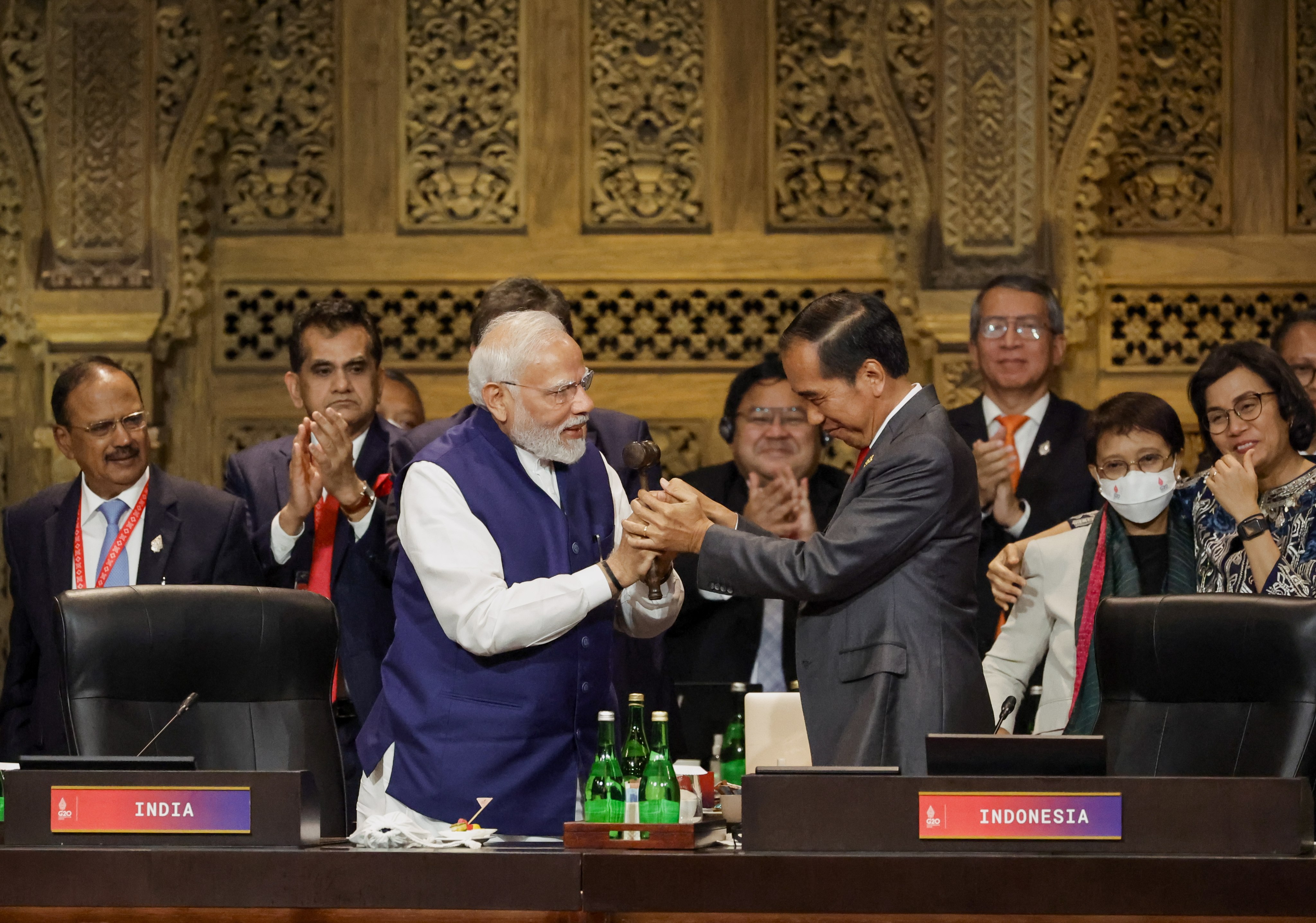 Indonesian President Joko Widodo (right) passes the gavel to Indian Prime Minister Narendra Modi in a handover ceremony during the Group of 20 Leaders’ Summit in Bali, Indonesia, on November 16. India begins its G20 presidency on December 1. Photo: EPA-EFE
