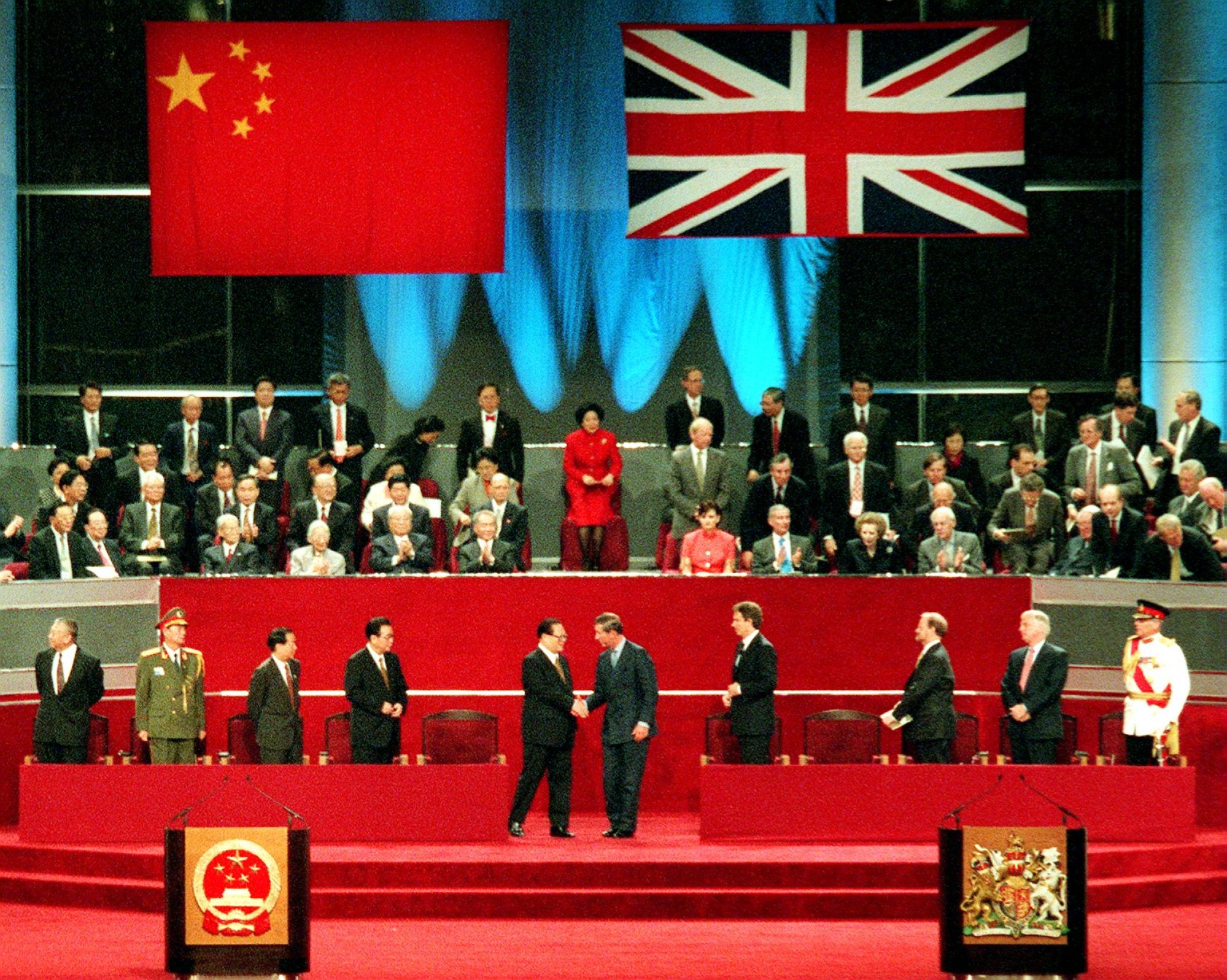 Jiang Zemin shakes hands with Prince Charles at the handover ceremony. Photo: SCMP