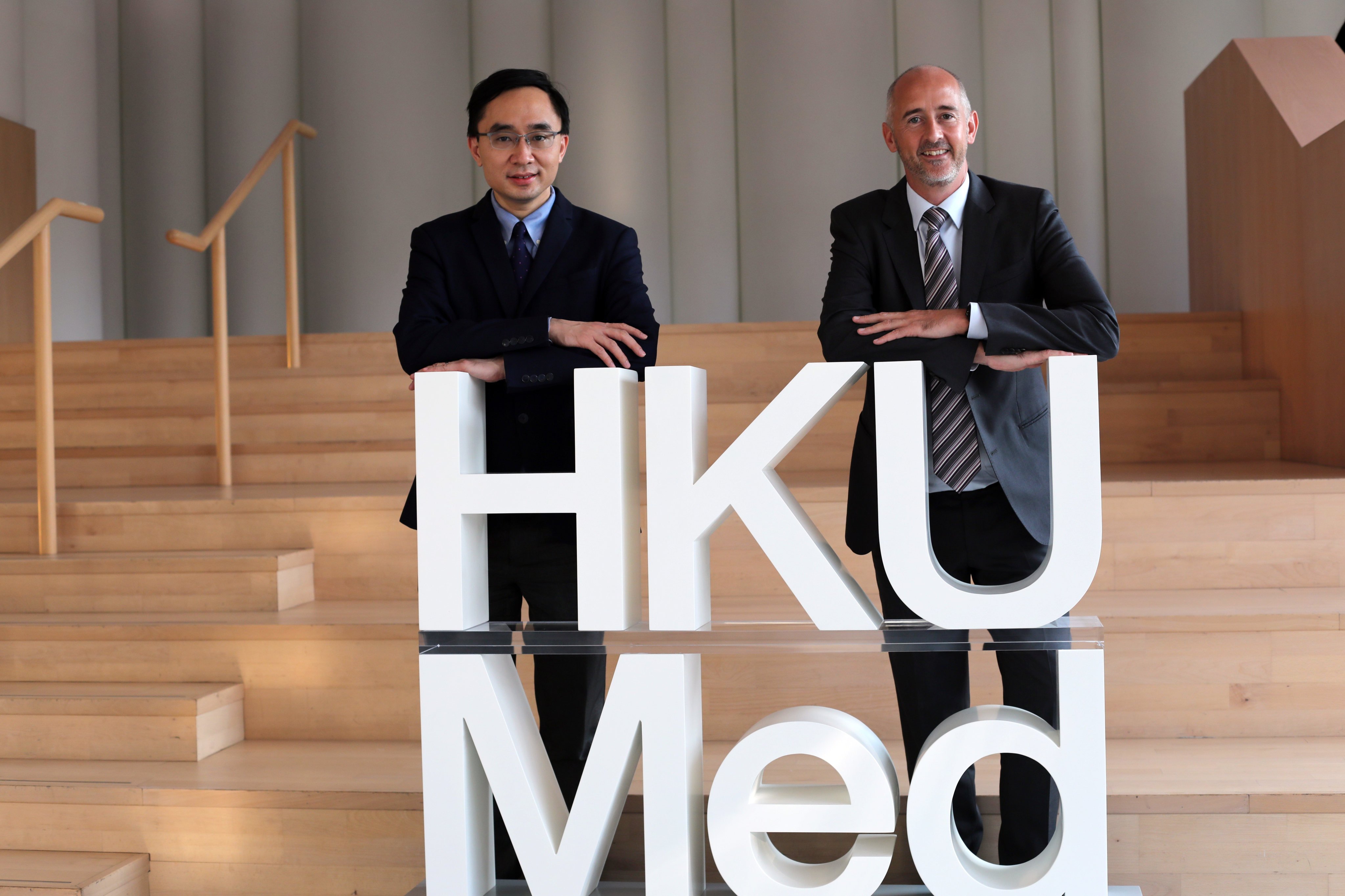 Dr. Victor Lee Ho-Fun (left), of Queen Mary Hospital from University of Hong Kong (HKU), and Gareth Lane of Roche Hong Kong. Photo:  Xiaomei Chen