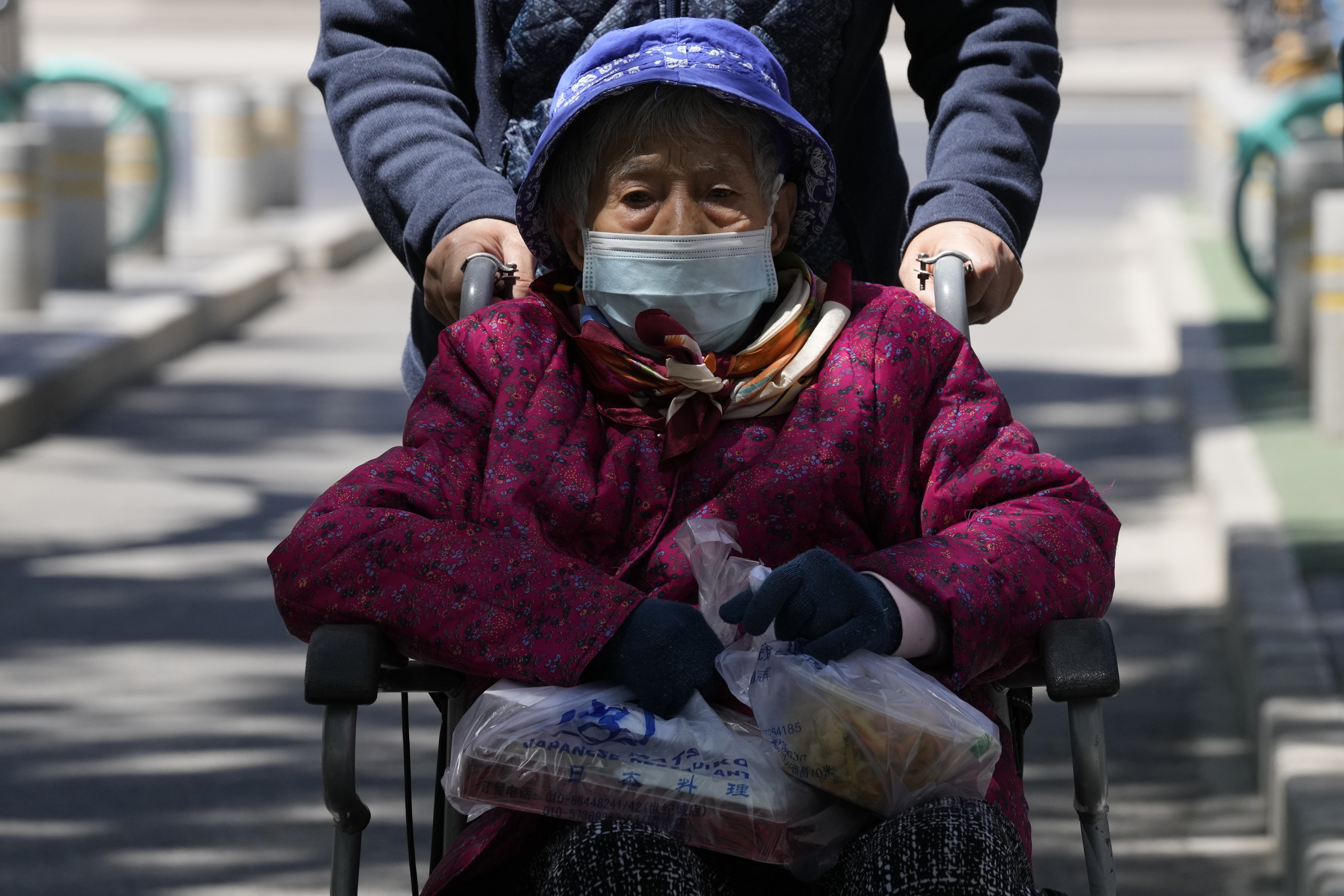 Only 76.6 per cent of Chinese people aged 80 and above have received their first dose of the Covid-19 vaccine. Photo: AP