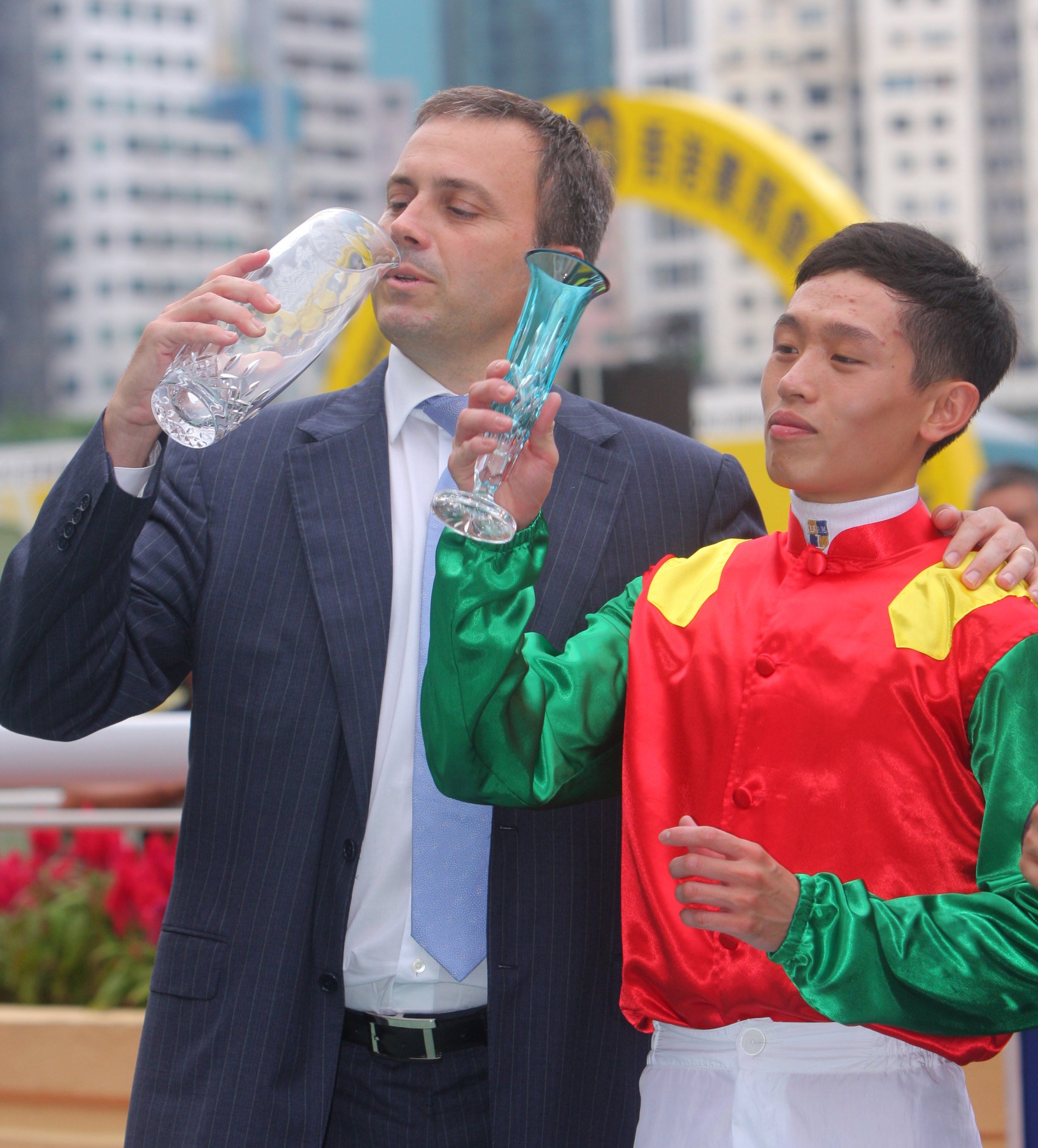 Trainer Caspar Fownes and jockey Vincent Ho celebrate a winner in 2010.