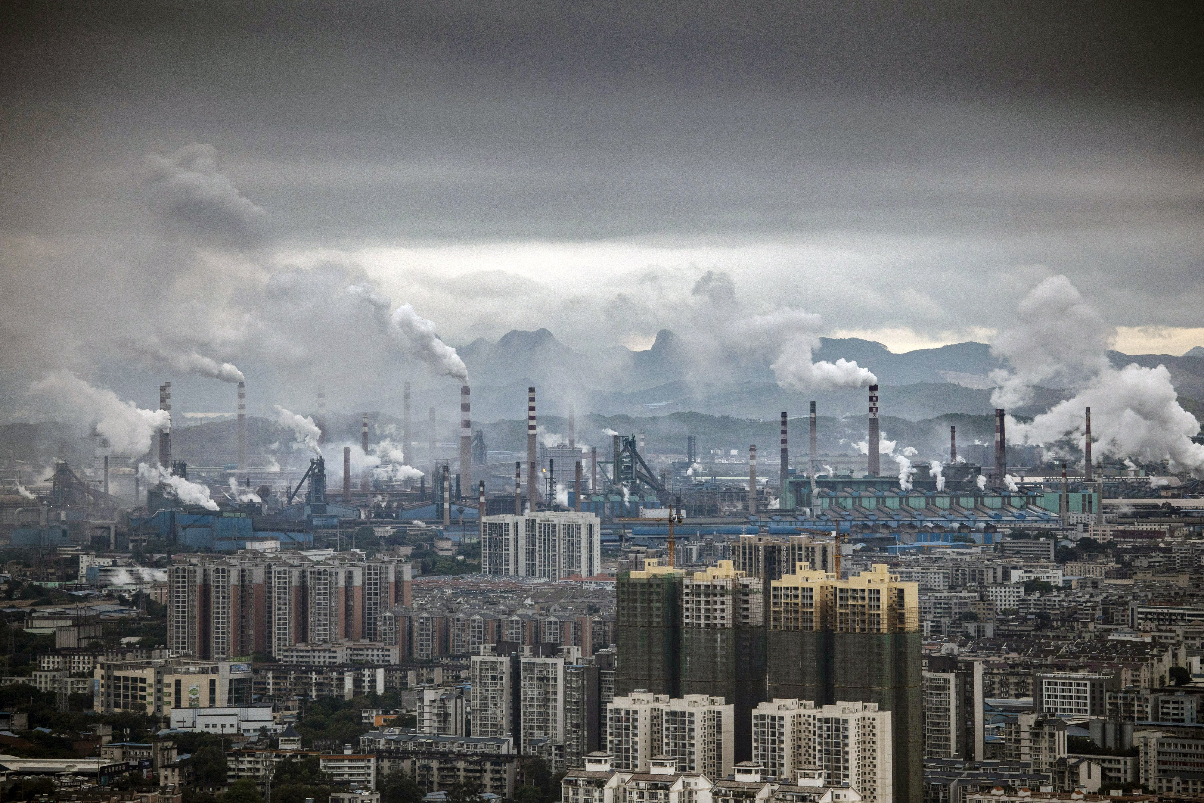 Smoke rises from a large industrial complex surrounding the Liuzhou Iron & Steel Company’s facility in Liuzhou, China, on May 17, 2021. Photo: Bloomberg