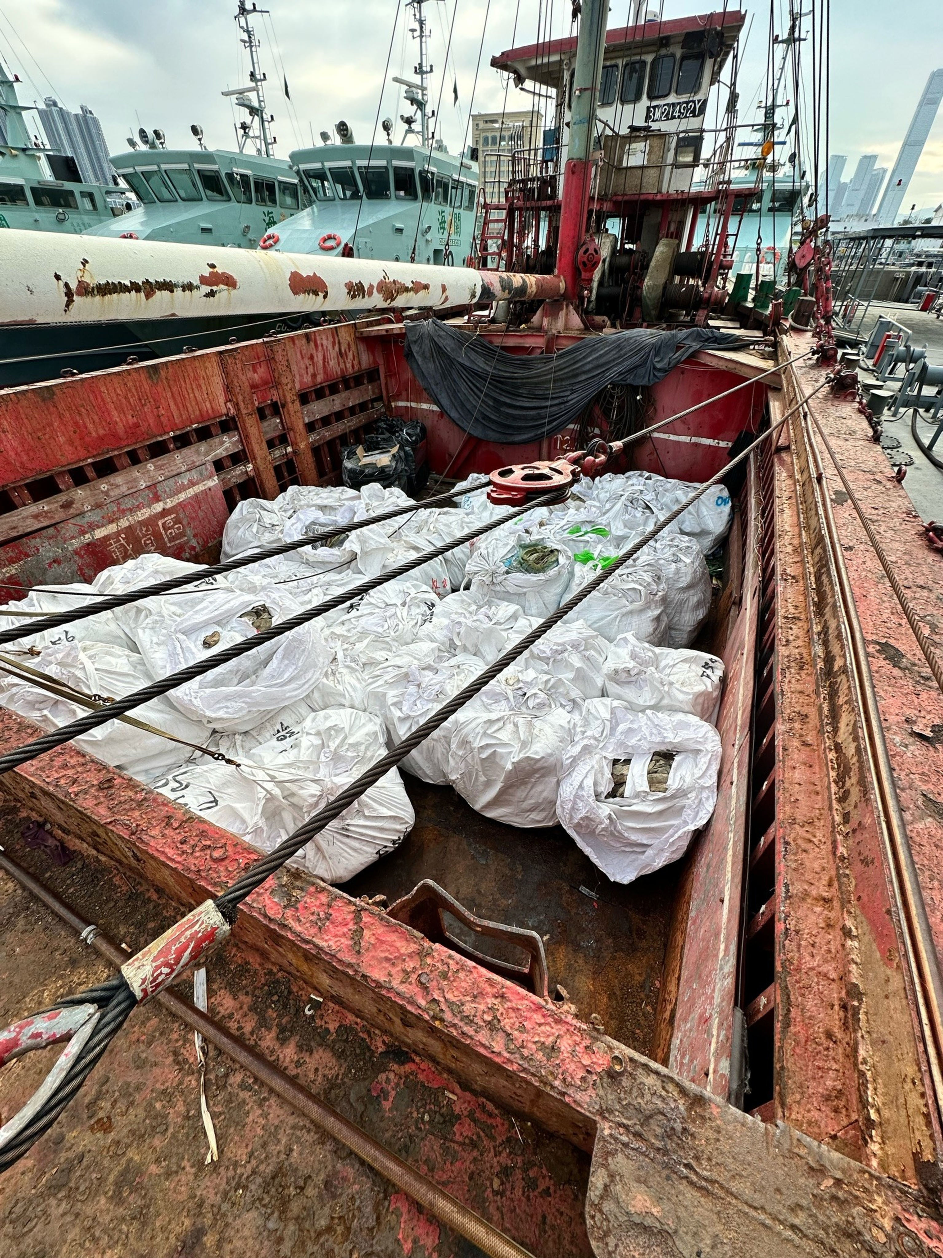 Tonnes of frozen meat have been seized by Hong Kong customs officers after a cargo ship and a speedboat were intercepted off Lamma Island. Photo: SCMP

