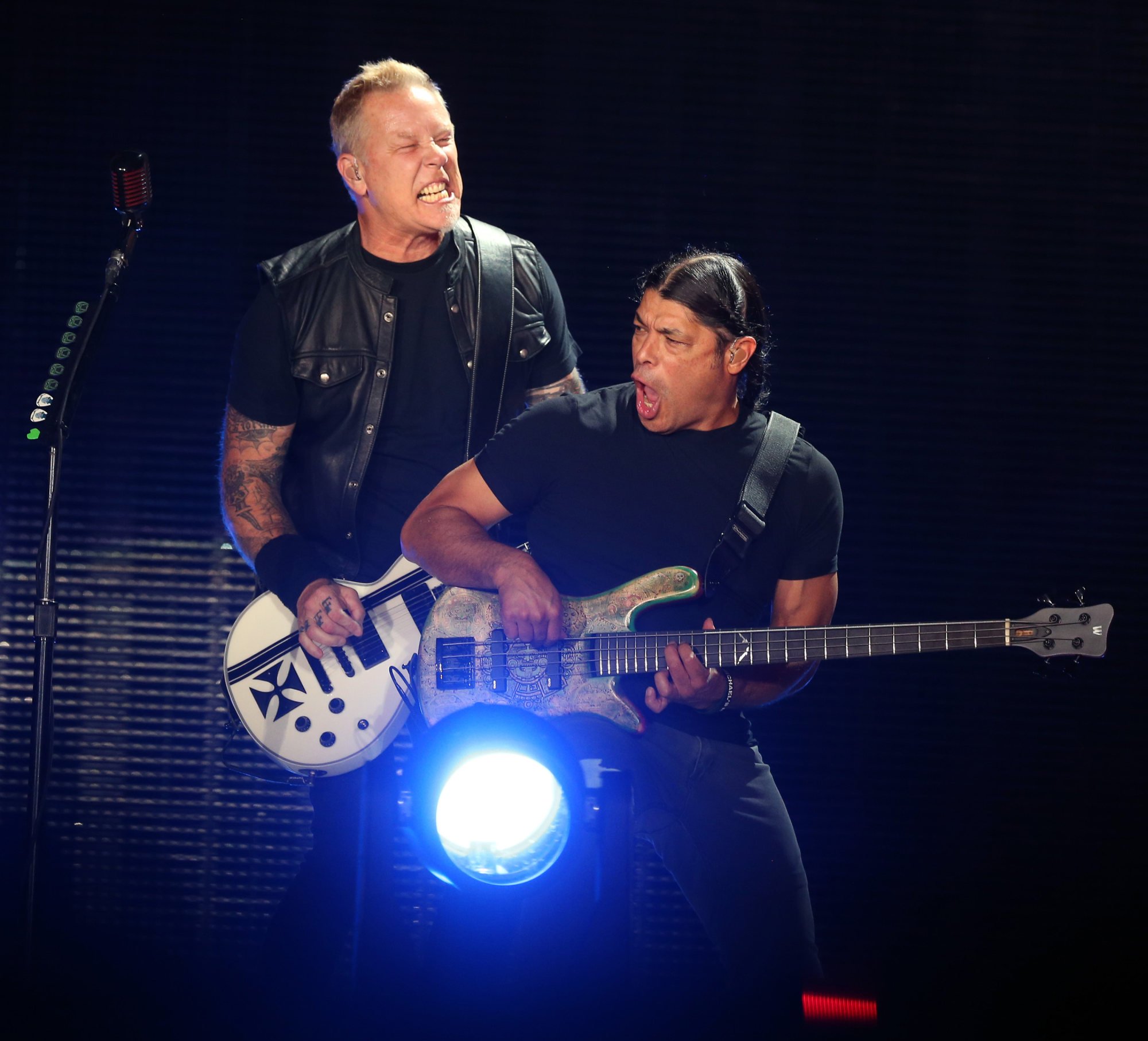 Metallica members, from left, Robert Trujillo, James Hetfield and