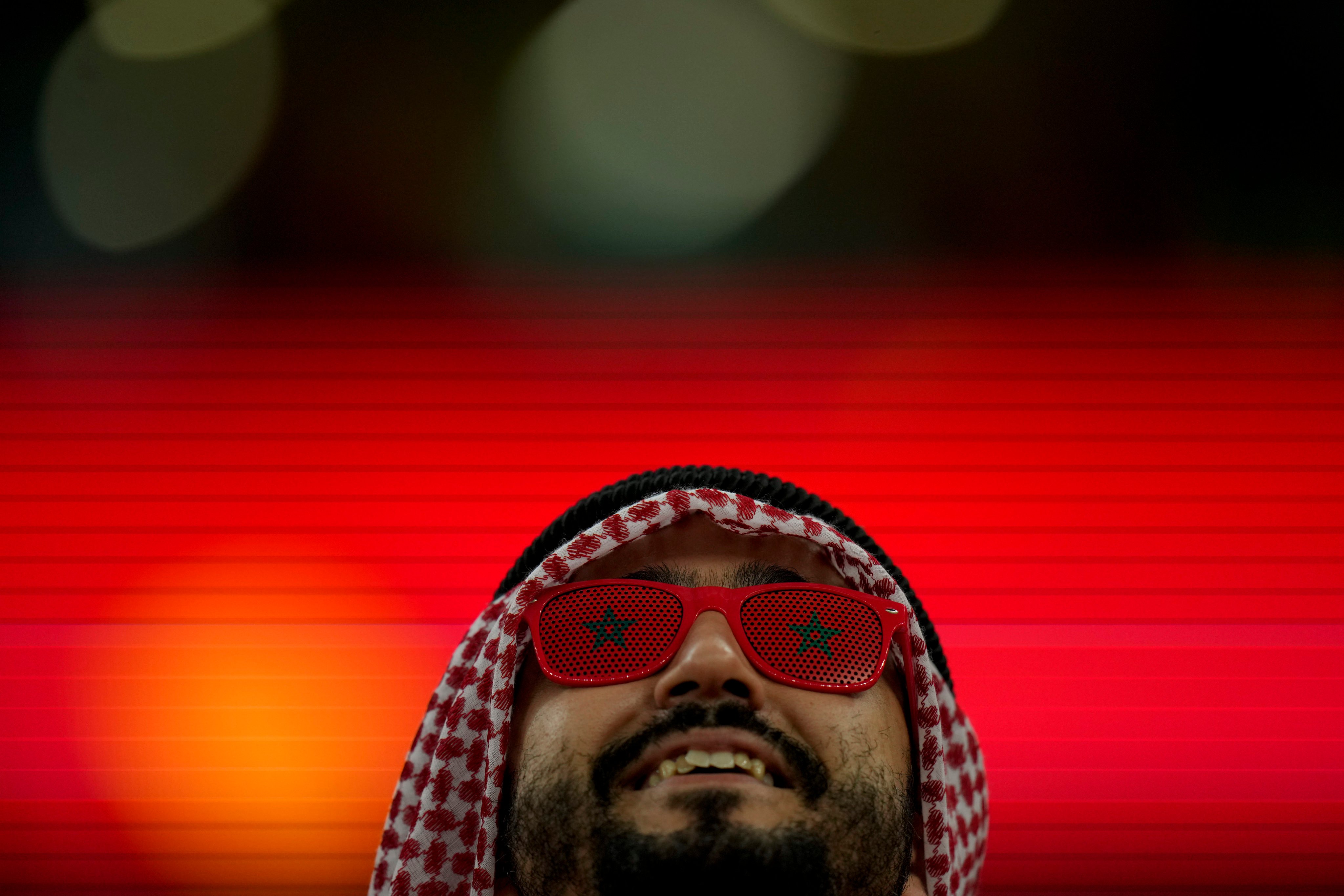 A fan supporting Morocco poses prior to its knock-out match against Spain. Photo: AP