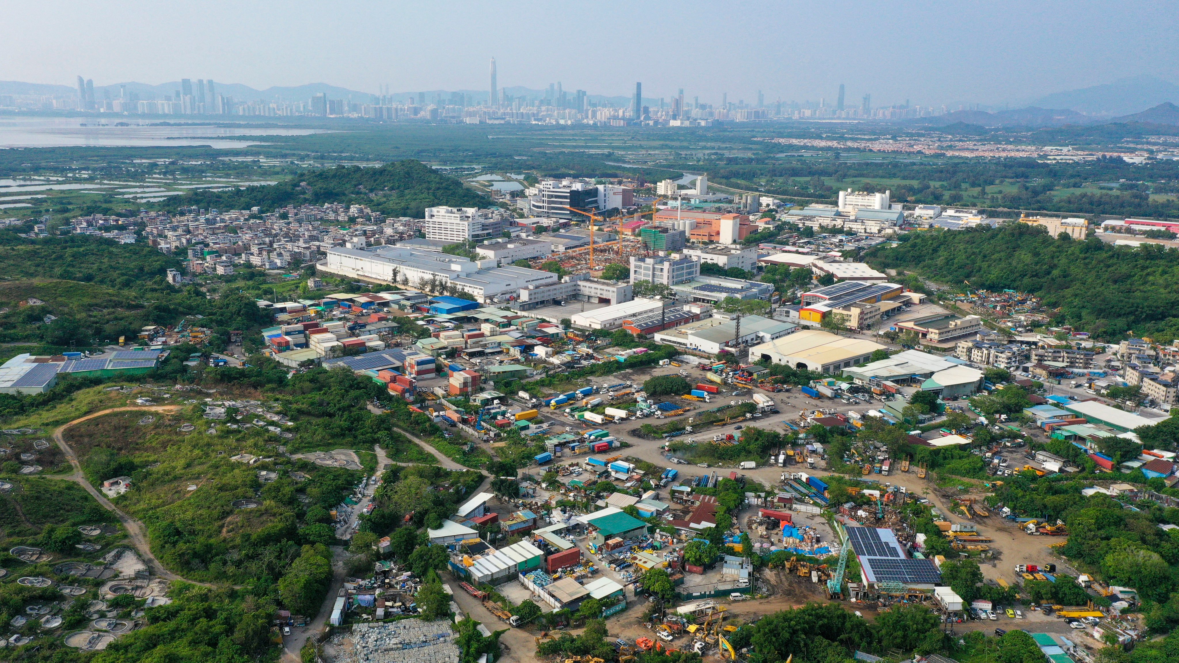 The government will strive to postpone the eviction of operators using brownfield sites to be reclaimed for town planning in the New Territories, the secretary for development says. Photo: May Tse