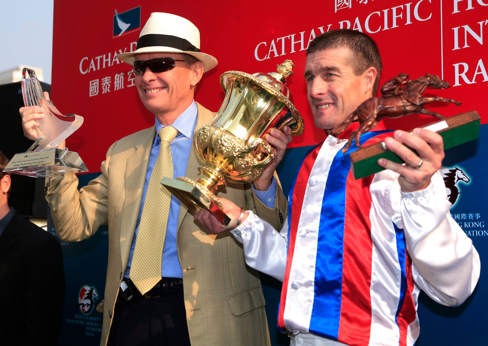 Trainer John Moore and jockey Darren Beadman enjoy the spoils after Inspiration’s 2008 Hong Kong Sprint victory.