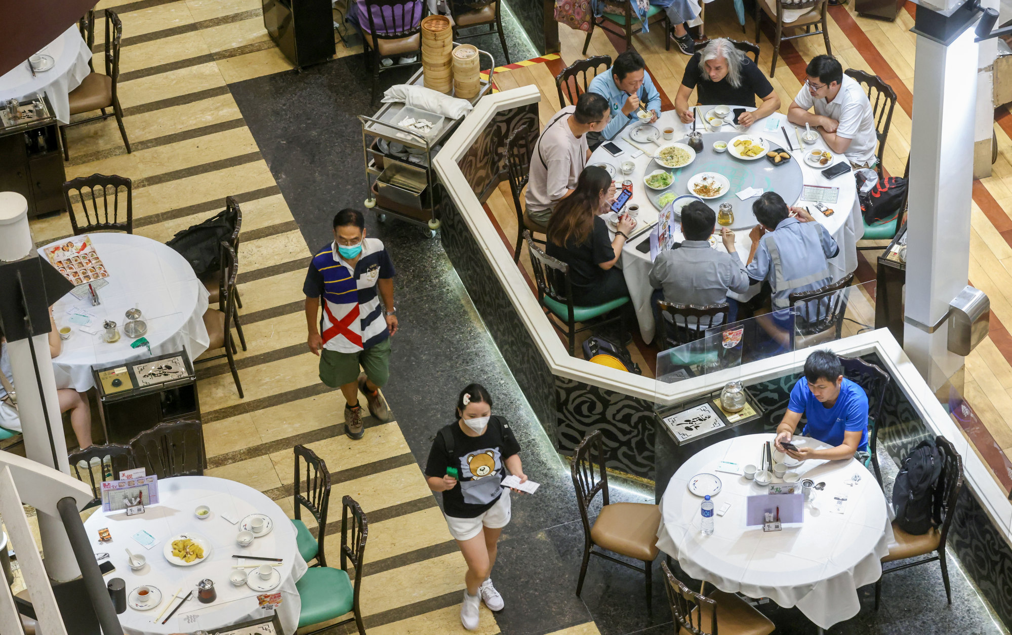 Hong Kong’s catering sector is still unsatisfied with the incremental easing of Covid rules, which will do little for business over the year-end holidays. Photo: K. Y. Cheng
