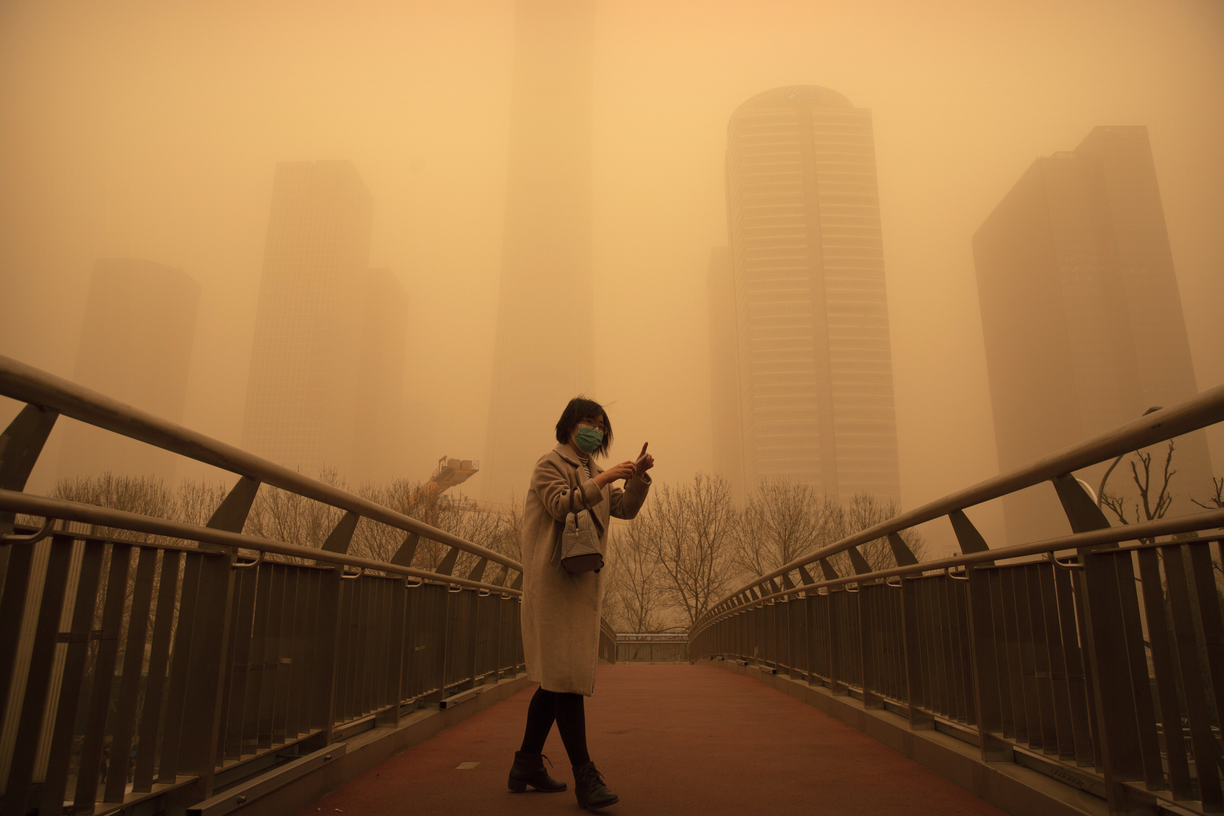 China and Mongolia are working together to prevent desertification, which can result in sandstorms blanketing major cities, as was seen here in Beijing in March 2021. Photo: AP