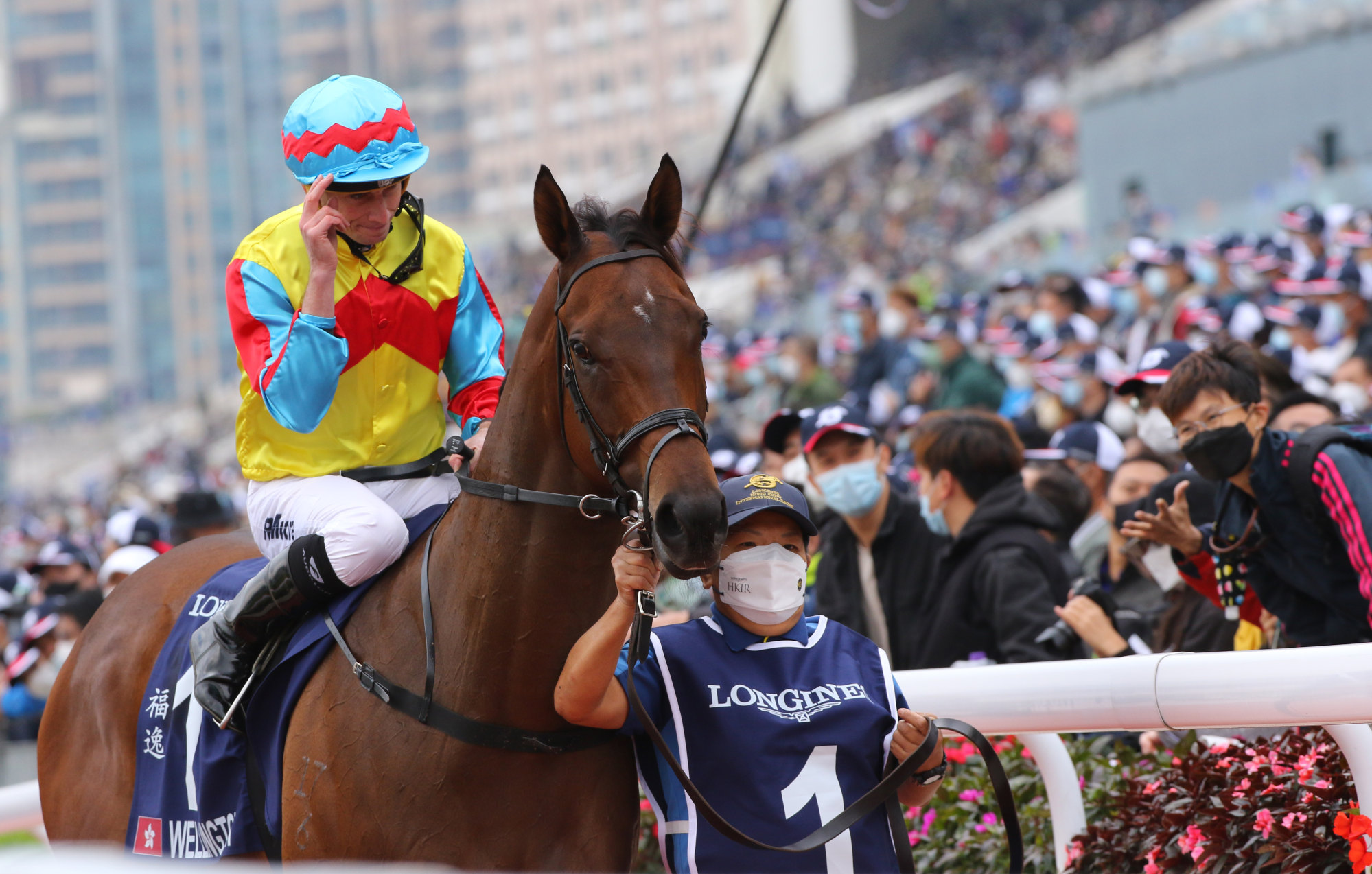 Ryan Moore acknowledges the crowd after winning the Hong Kong Sprint aboard Wellington.