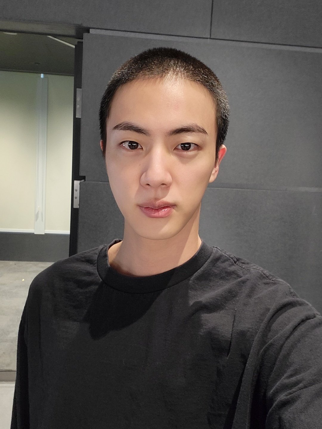 Jin of BTS snows off a new army style haircut, as he is being conscripted in the the South Korean Armed Forces. Photo: Weverse / @Jin
