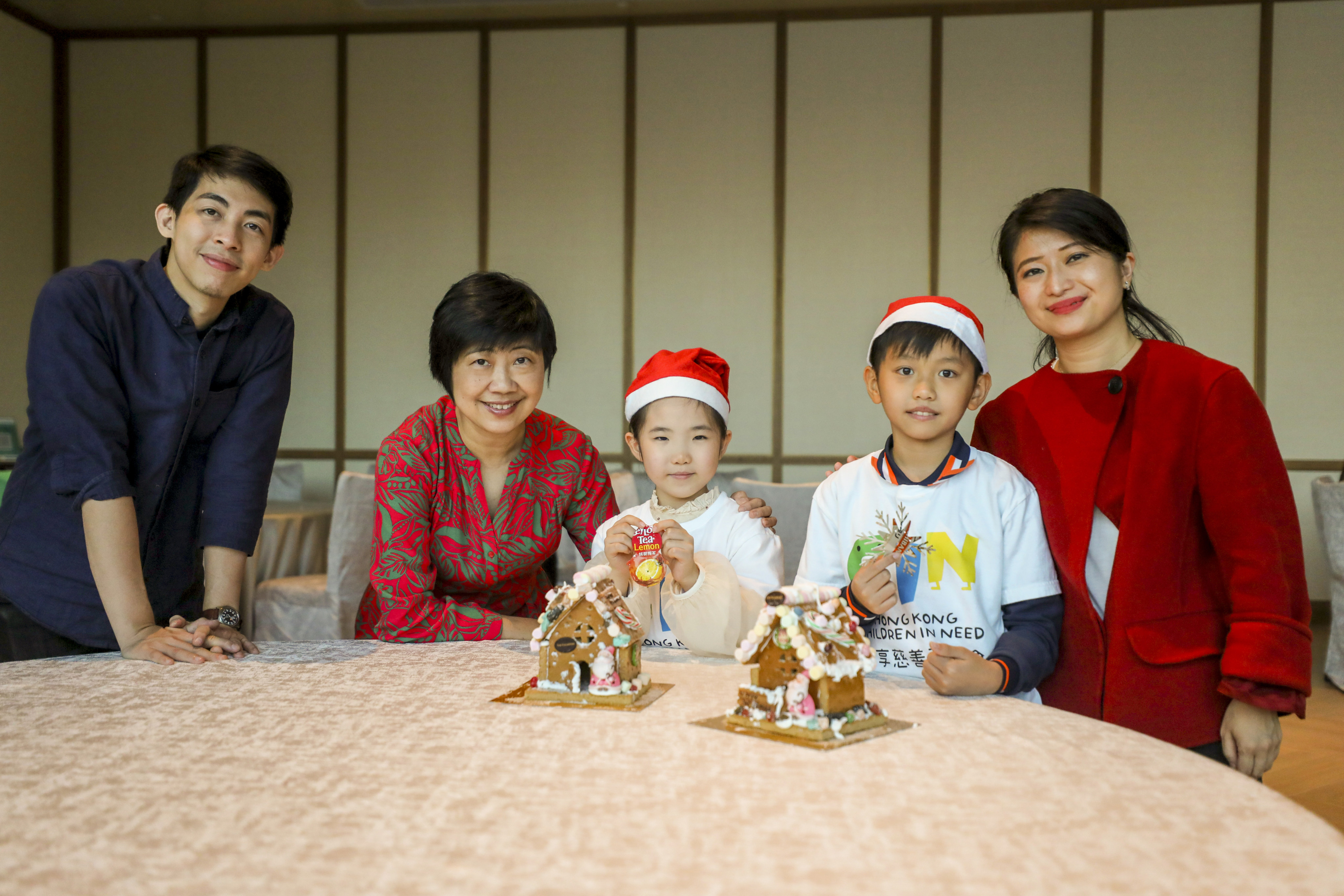 Children take part in a Christmas workshop with Sino Group executives as part of Operation Santa Claus. Photo: Xiaomei Chen