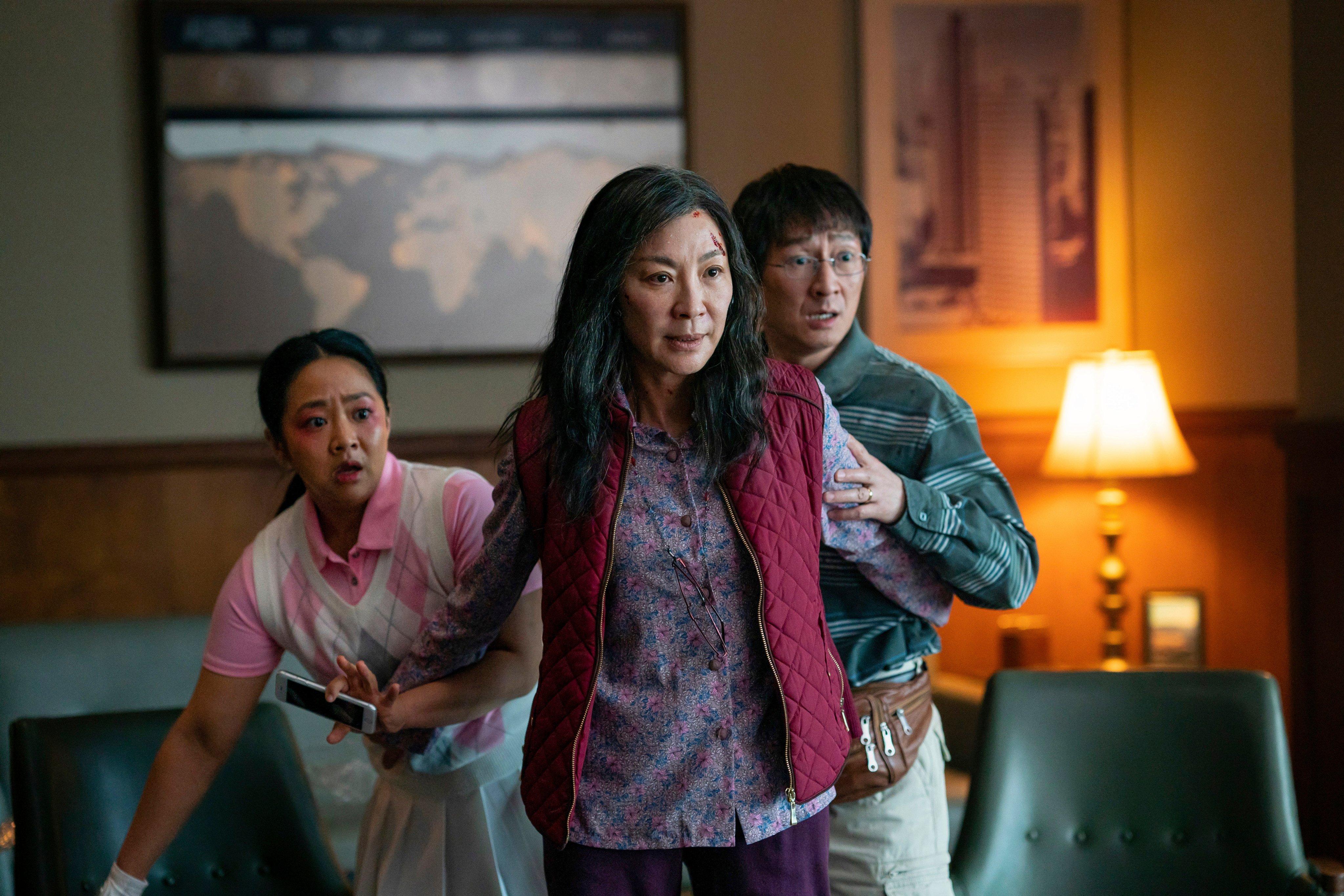 (From left) Stephanie Hsu, Michelle Yeoh and Ke Huy Quan appear in a scene from Everything Everywhere All at Once. Photo: A24 Films via AP