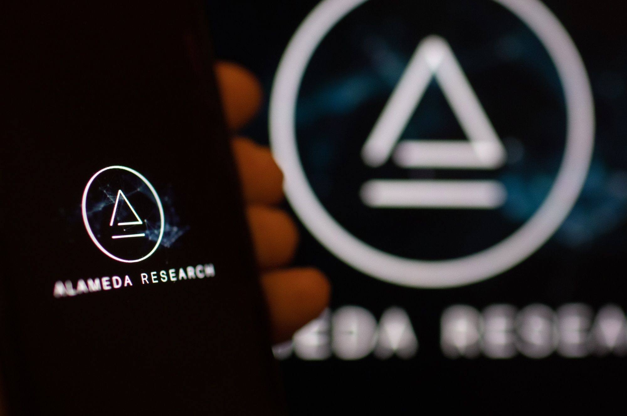The logo of Alameda Research LLC on digital devices arranged in Riga, Latvia, on November 22, 2022. Photo: Bloomberg