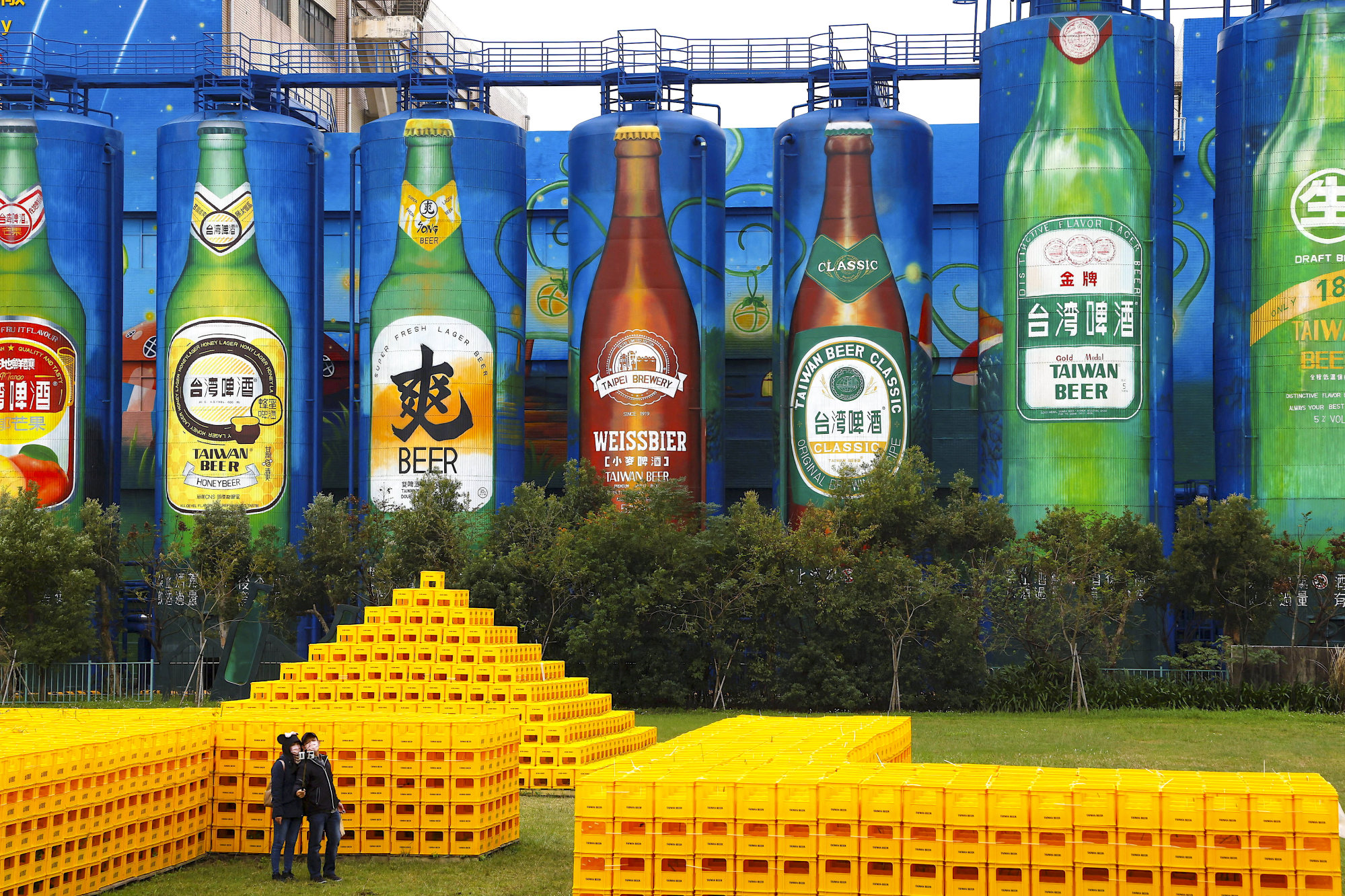 Tourists take photos at the Zhunan Brewery in Miaoli, owned by Taiwan Tobacco and Liquor Corp, whose products are among those blocked by Beijing. Photo: Reuters