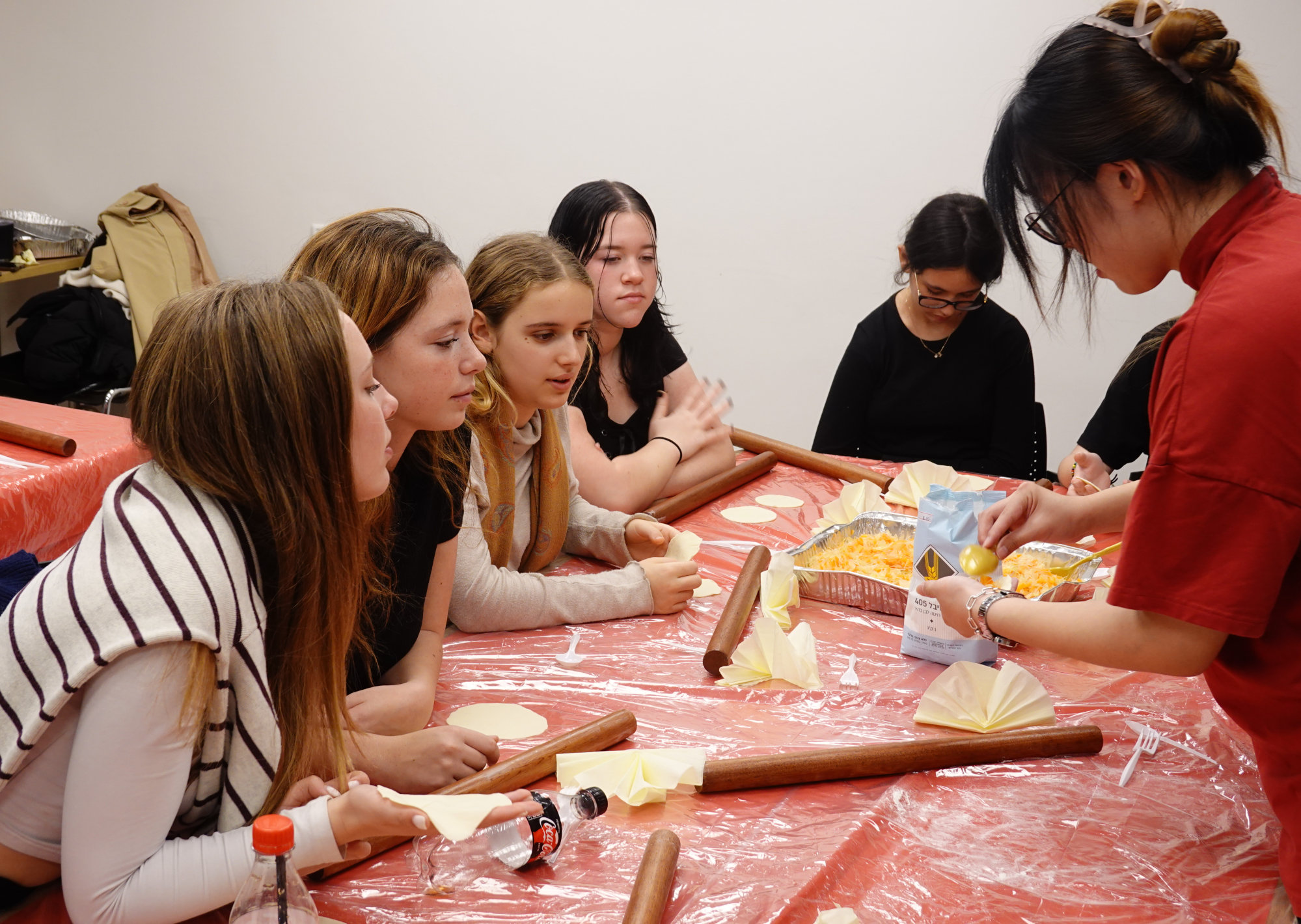 Students learn to make dumplings during “Confucius Day” at a Chinese cultural festival at the Hebrew University of Jerusalem, on December 5. Confucianism has had a great impact on Chinese culture. Photo: Xinhua