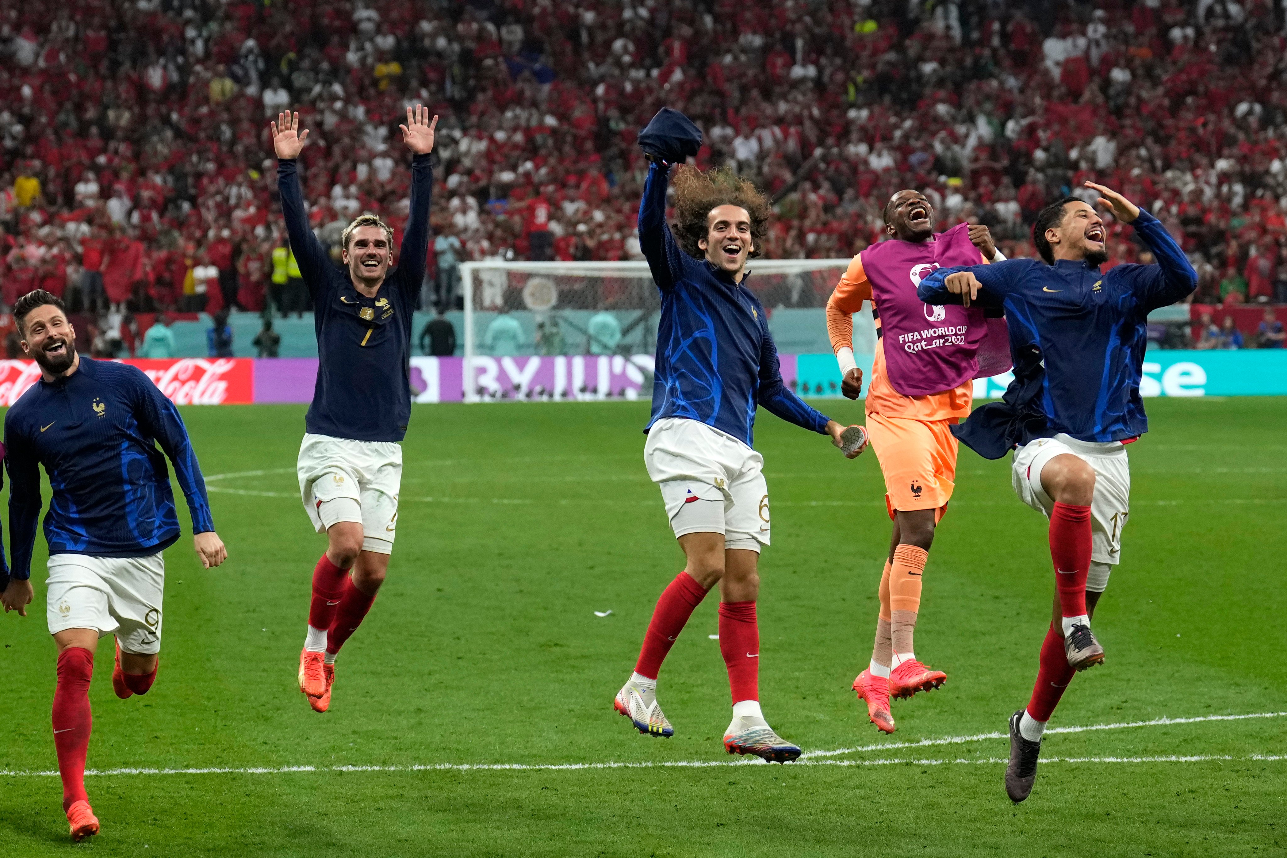 The French players celebrate their World Cup semi-final win over Morocco in Qatar on Wednesday. Photo: AP