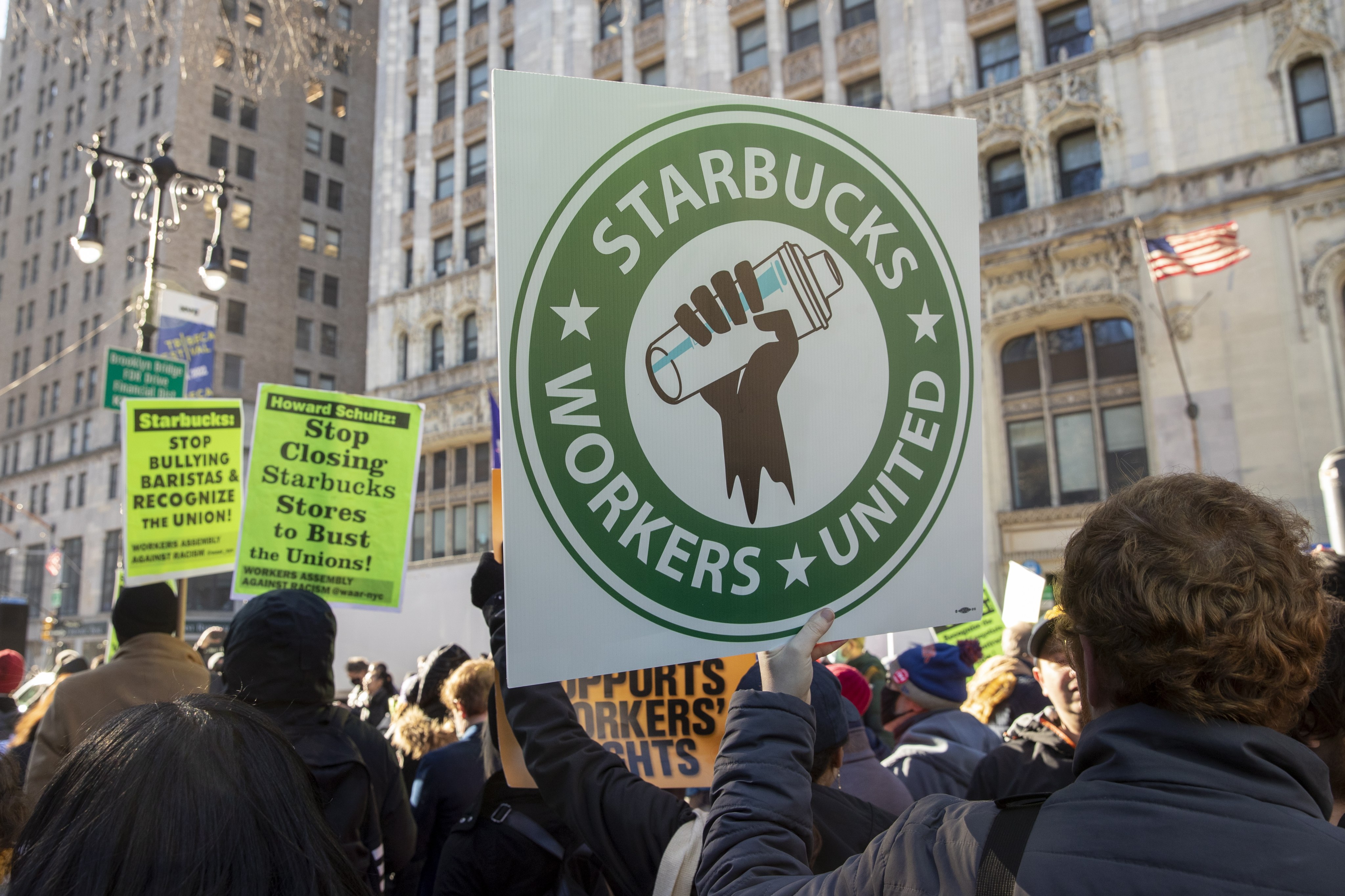 Starbucks workers and their supporters participate in a rally  to unionise the company. Photo: EPA-EFE