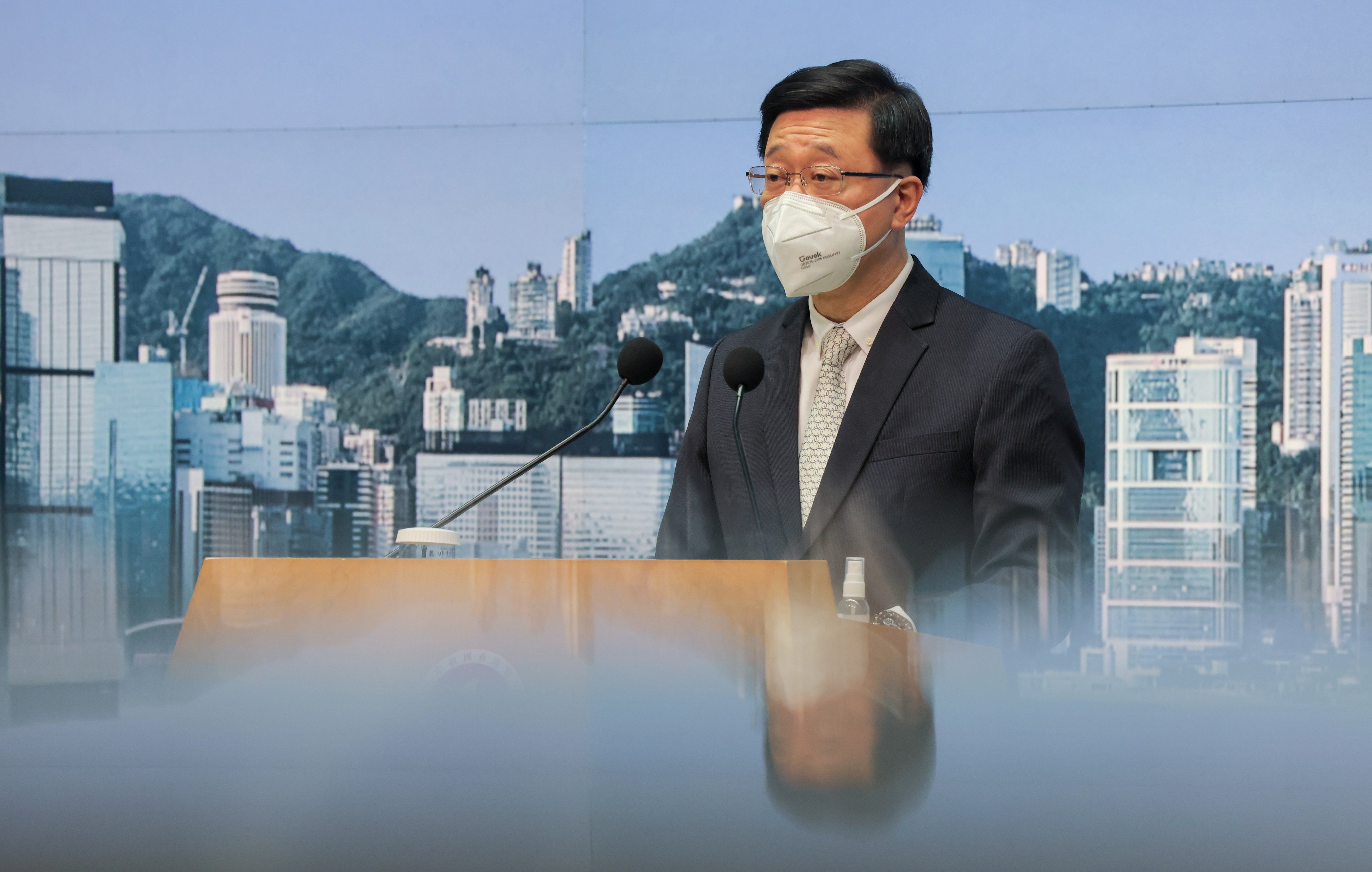 Chief Executive John Lee Ka-chiu announces the further easing of Covid-19 restrictions during a press conference at the Hong Kong government offices on December 13. Photo: Jelly Tse