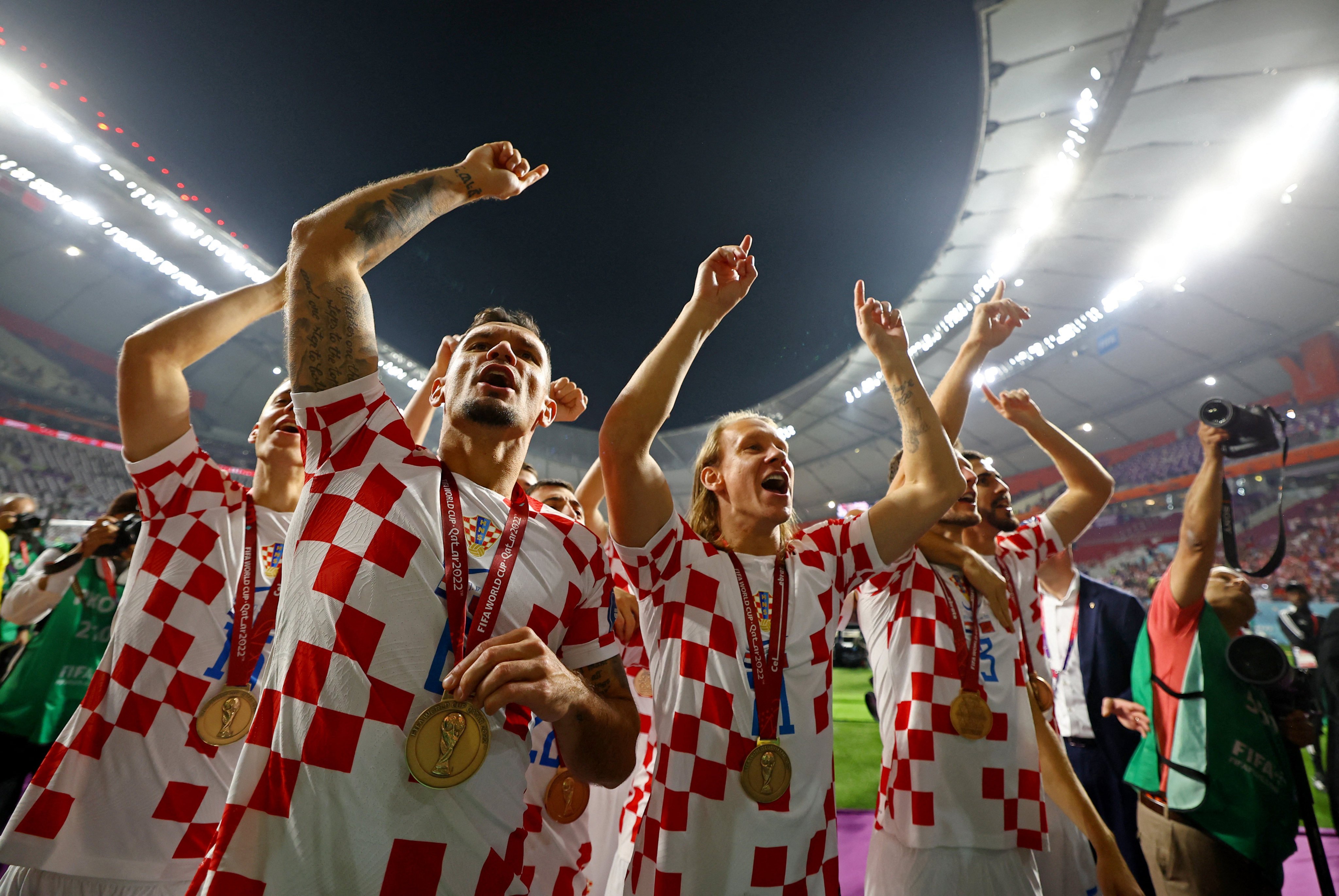 Croatia teammates celebrate with their medals as they finish in third place at the Fifa World Cup in Doha, Qatar on Saturday. Photo: Reuters 