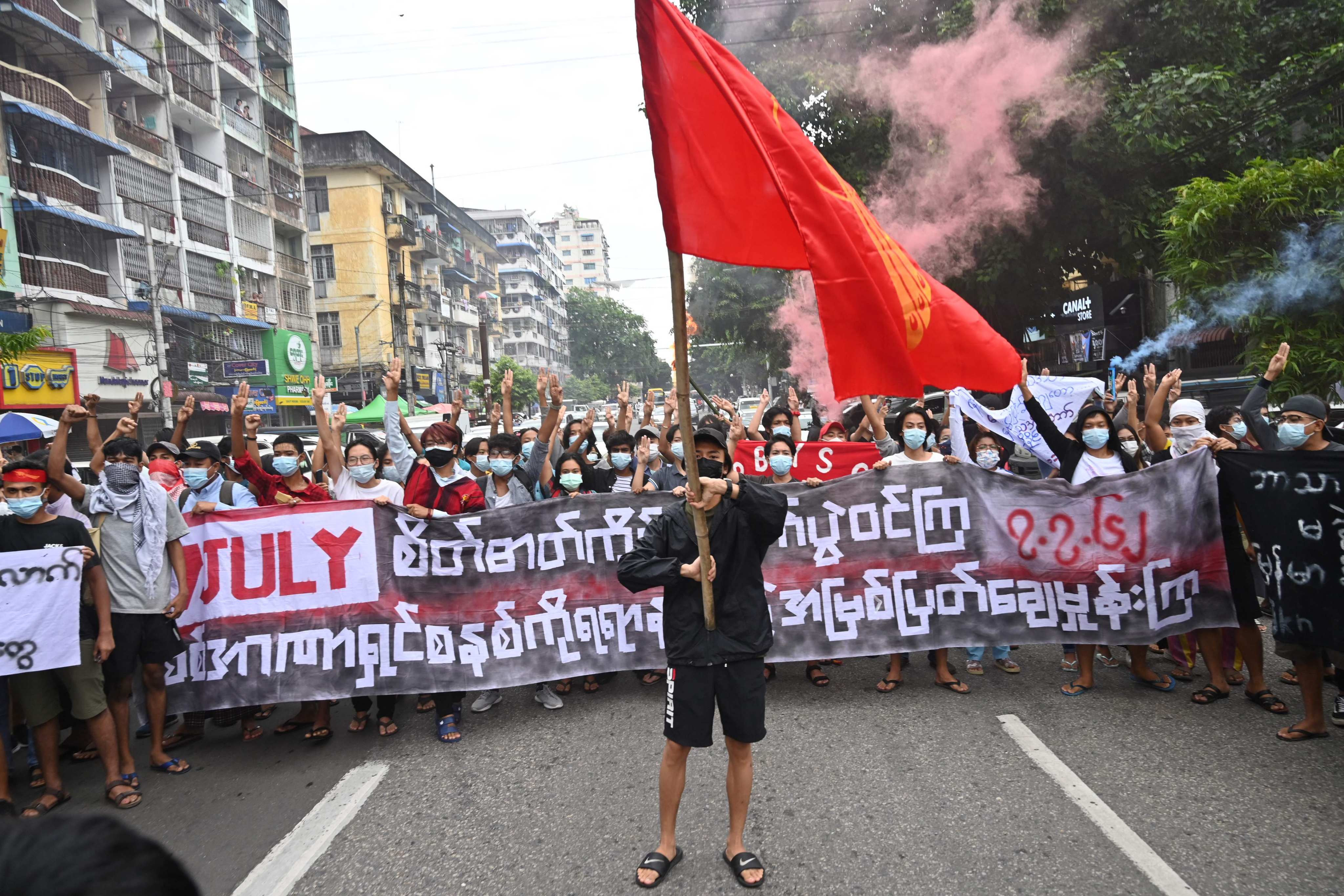 Anti-junta protesters in Myanmar last year. Resistance groups have successfully leveraged social media and online tools to raise money. Photo: AFP