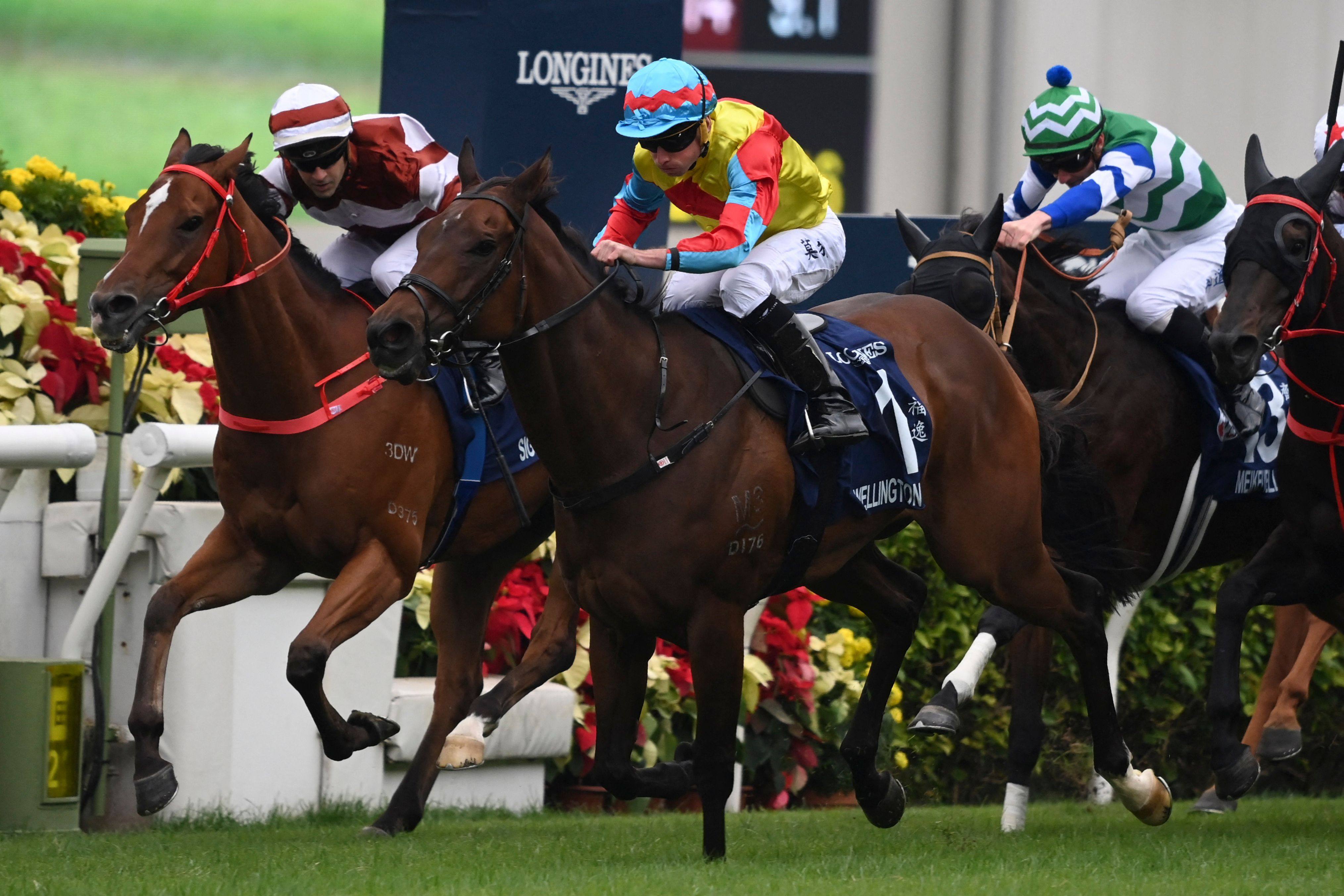 Jockeys cross the finish line in a horse race held at Sha Tin Racecourse in Hong Kong earlier this month. Photo: AFP