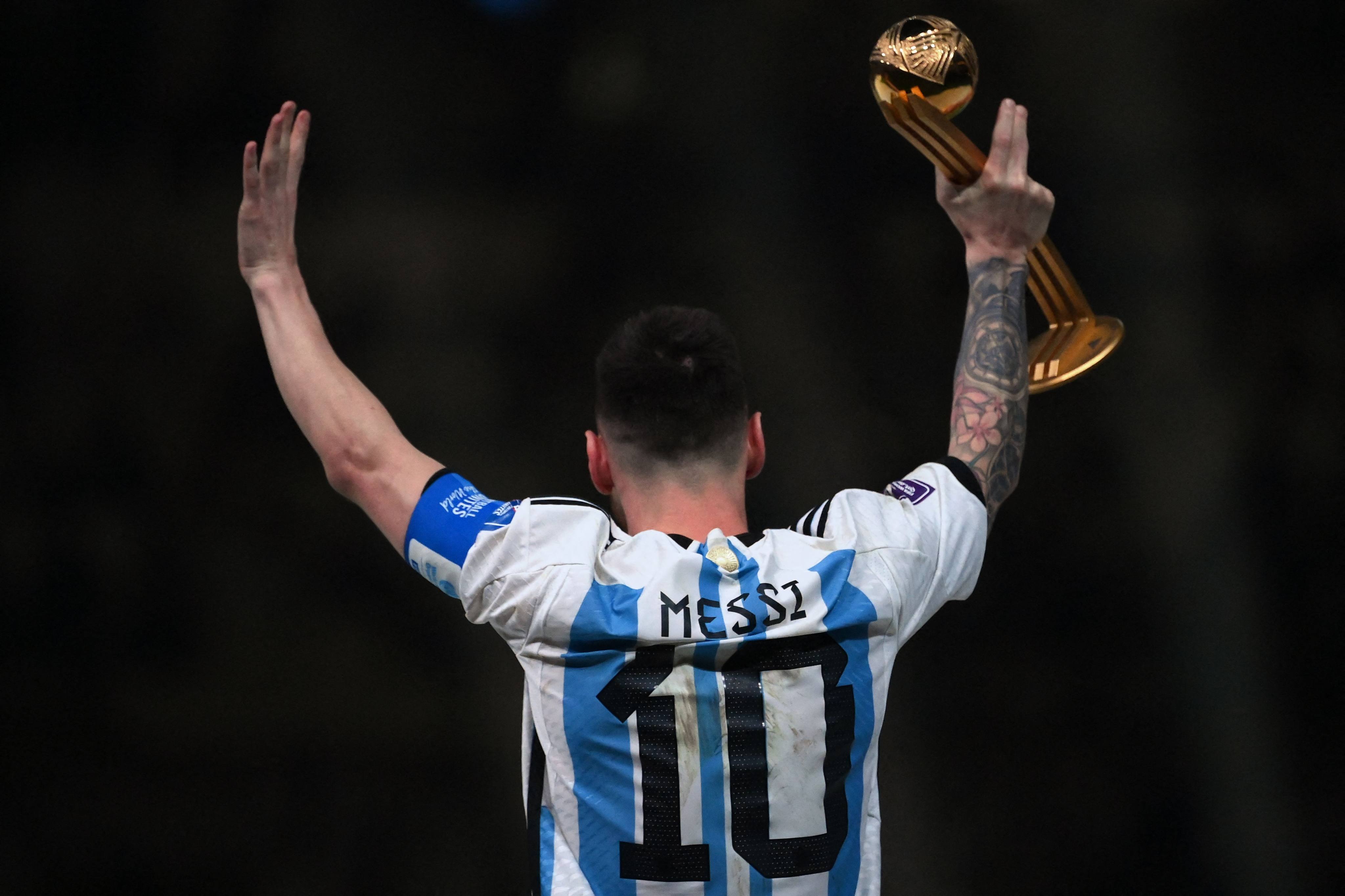Argentina’s Lionel Messi with the Golden Ball award after Argentina’s victory over France in the World Cup final in Qatar on Sunday. Photo: AFP