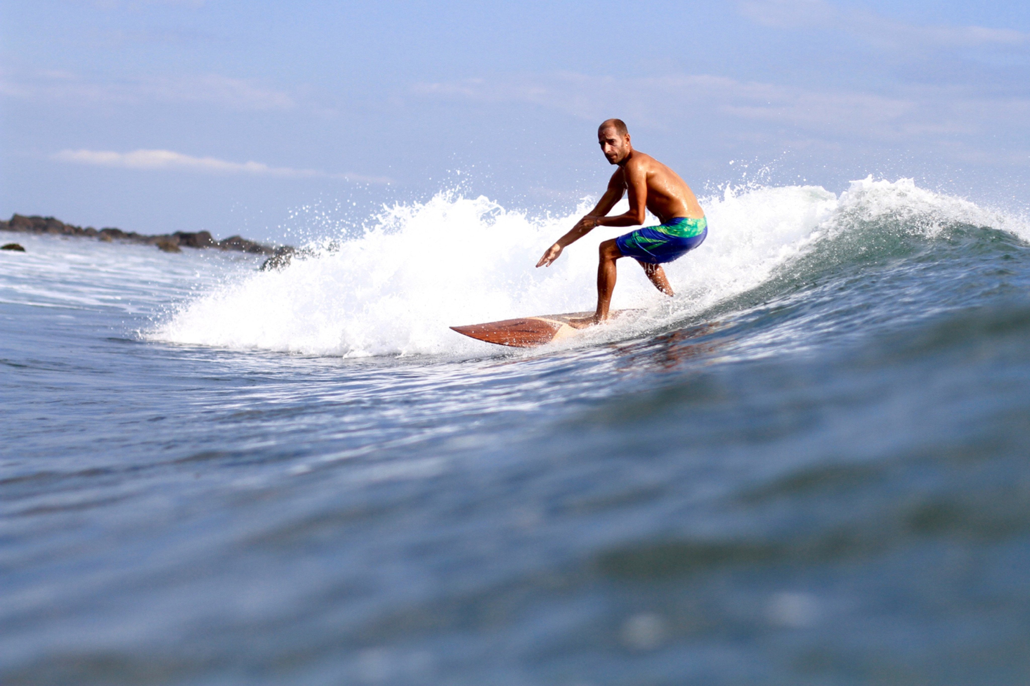 Mike Holzrichter, the former manager of a homestay in Medewi, surfs off the village in Bali. Photo: Mike Holzrichter