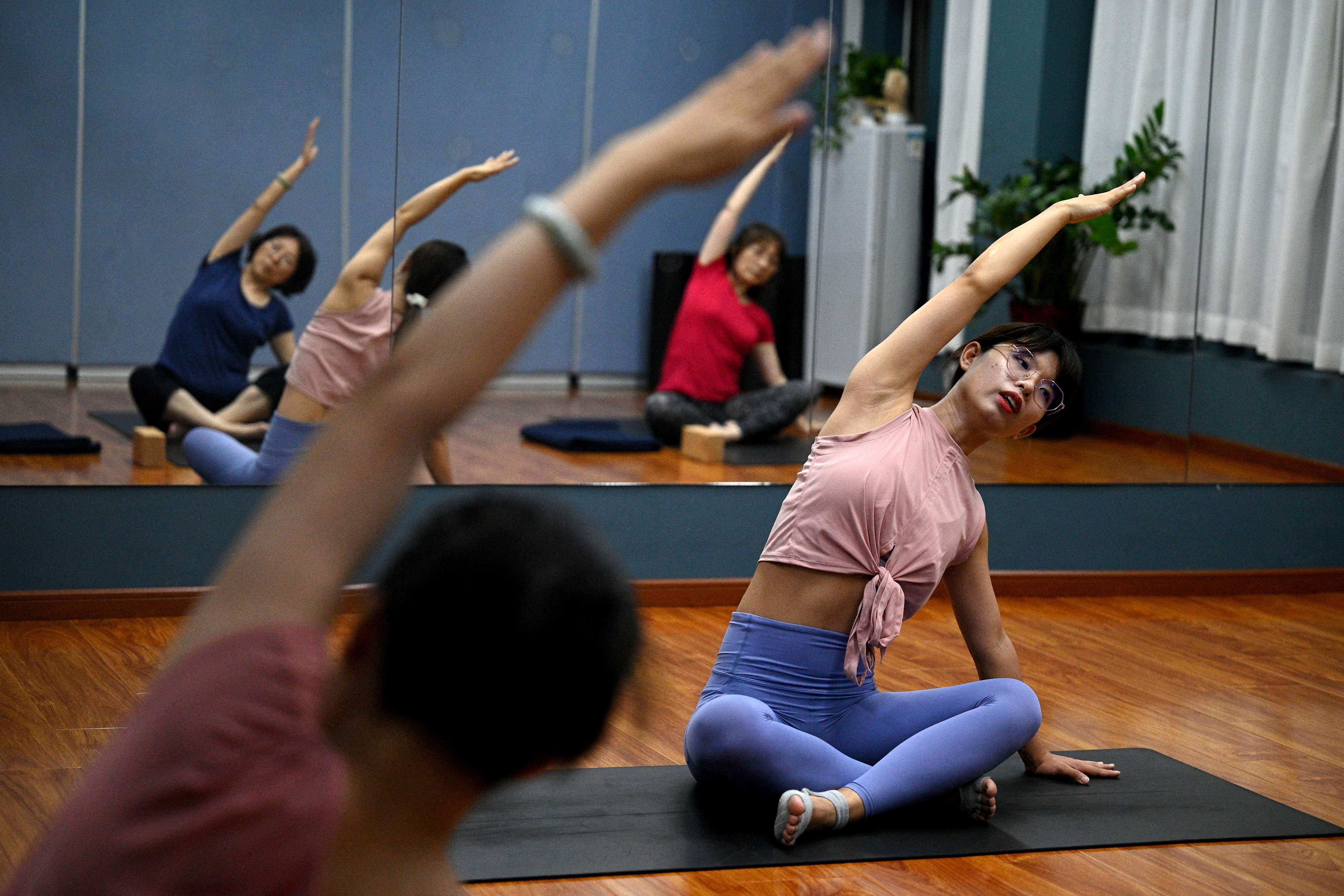 As China abandons its zero-Covid policy, many people – particularly young adults – are paying closer attention to their physical and mental well-being. Photo: AFP