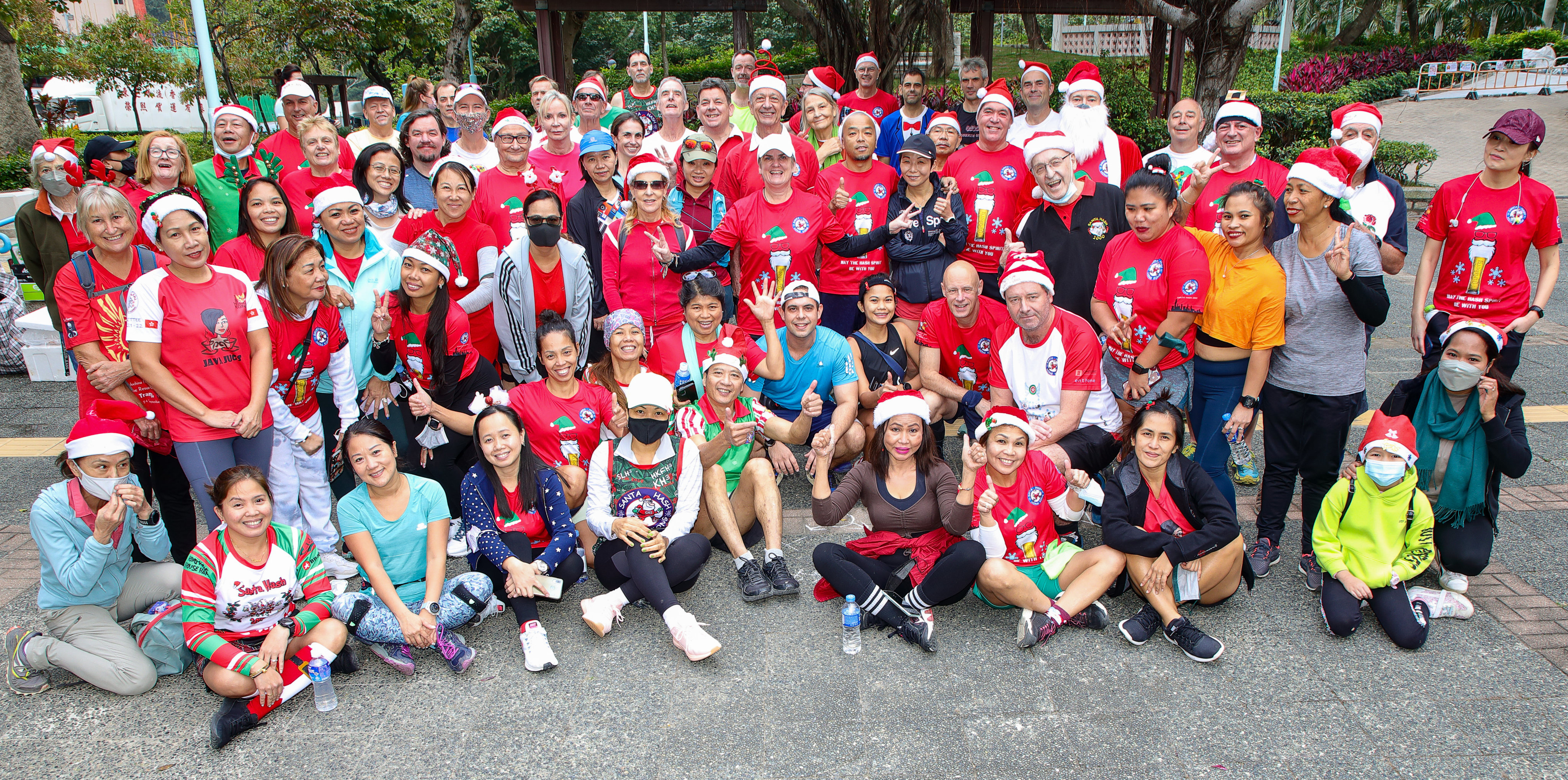 Hong Kong’s Hash House Harriers dress up as Kriss Kringle and run to raise money for charity. Photo: Bharat Khemlani