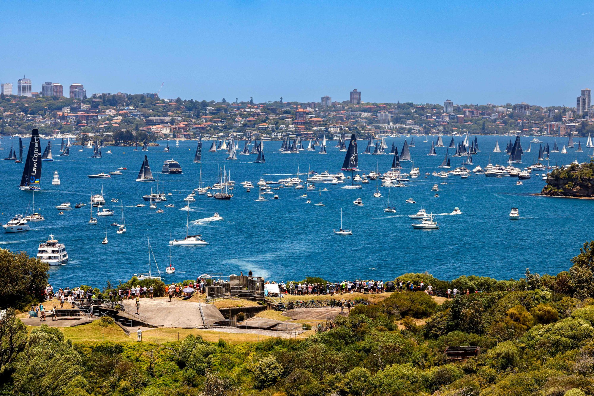 Sydney to Hobart: Andoo Comanche takes early lead as near collisions mark dramatic start to annual y